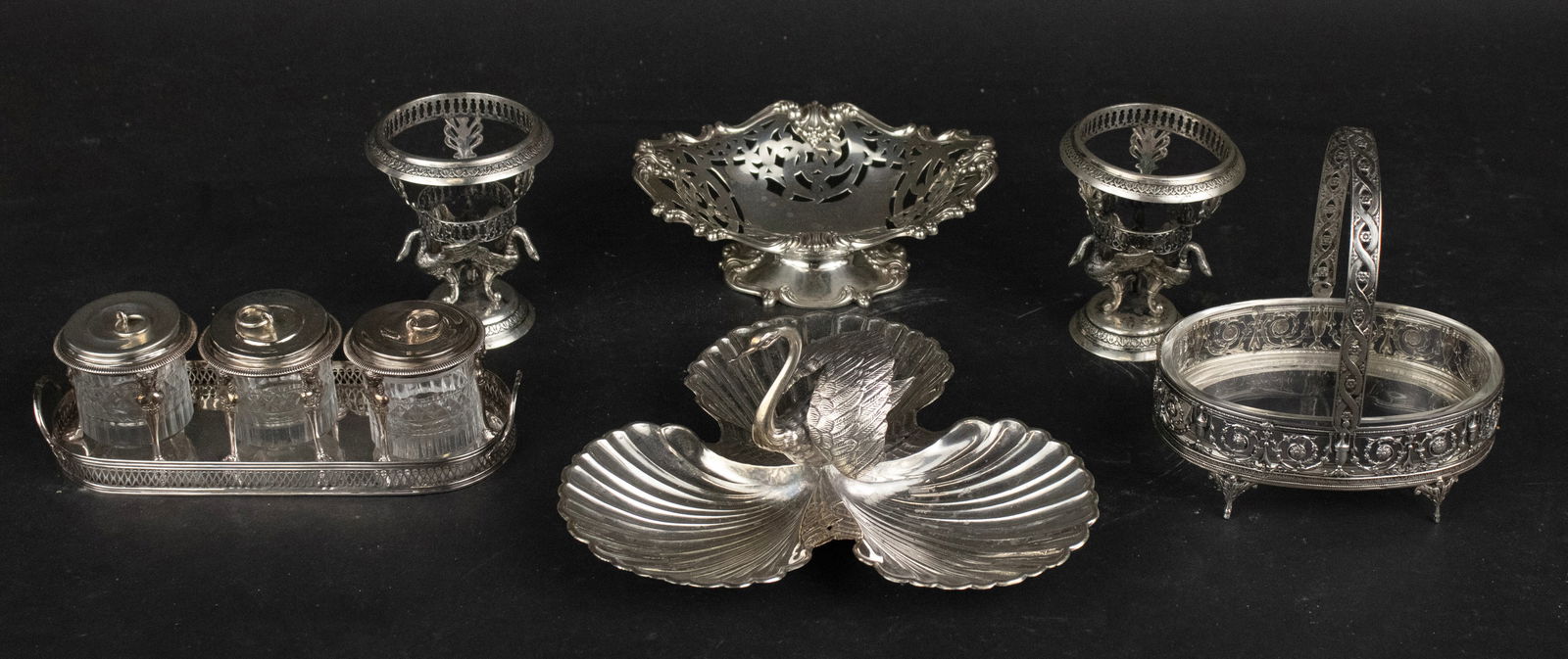 Continental 800 Silver and Glass Swing Basket: Continental 800 Silver and Glass Swing Basket Together with a sterling silver reticulated basket, an illegible marked three glass tray, two swan decorated 800 silver frames, and a swan decorated