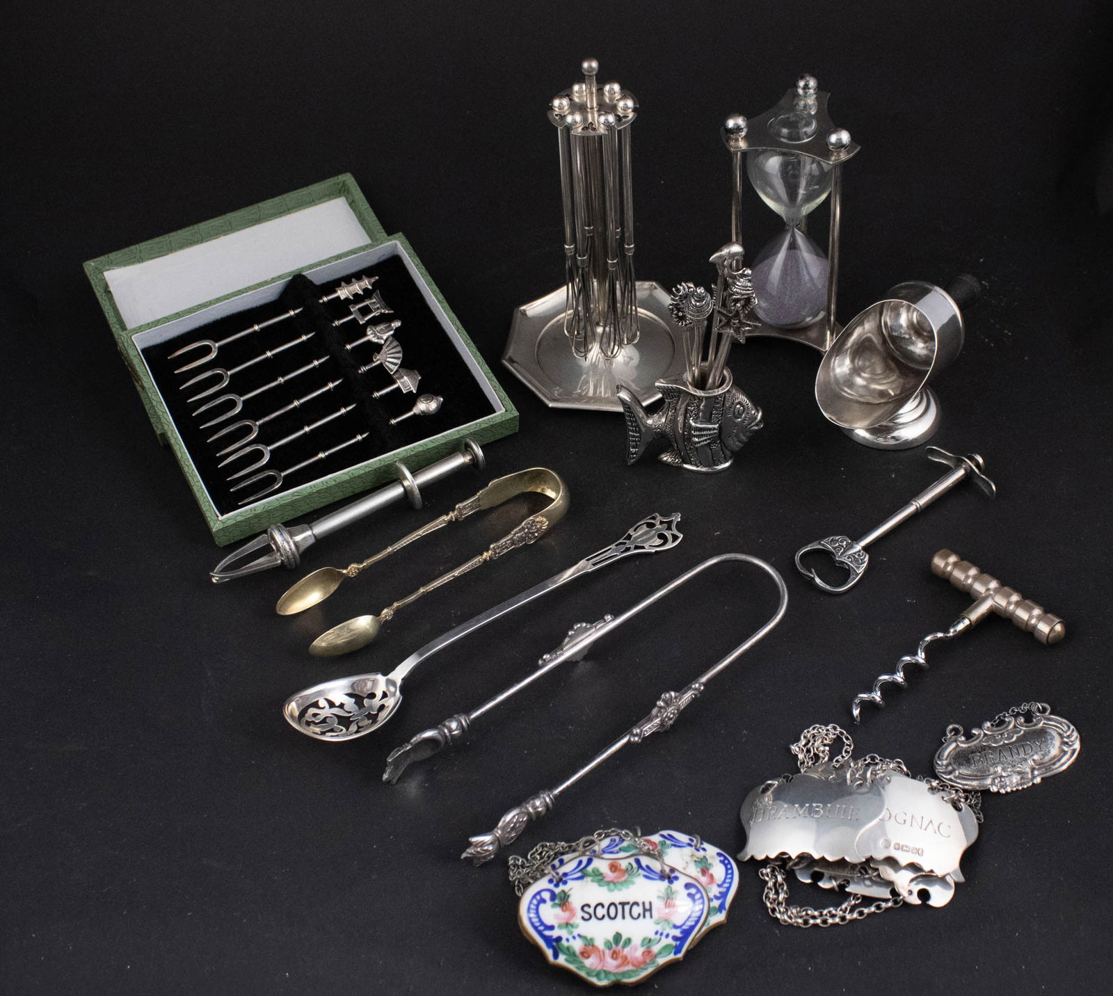 Eleven Sterling Silver Liquor Badges and Bar Accessories: Eleven Sterling Silver Liquor Badges and Bar Accessories Together with four French tags, a Paloma Picasso for Tiffany sterling silver cork screw, 855 silver stand with six 855 silver whisks, a sand