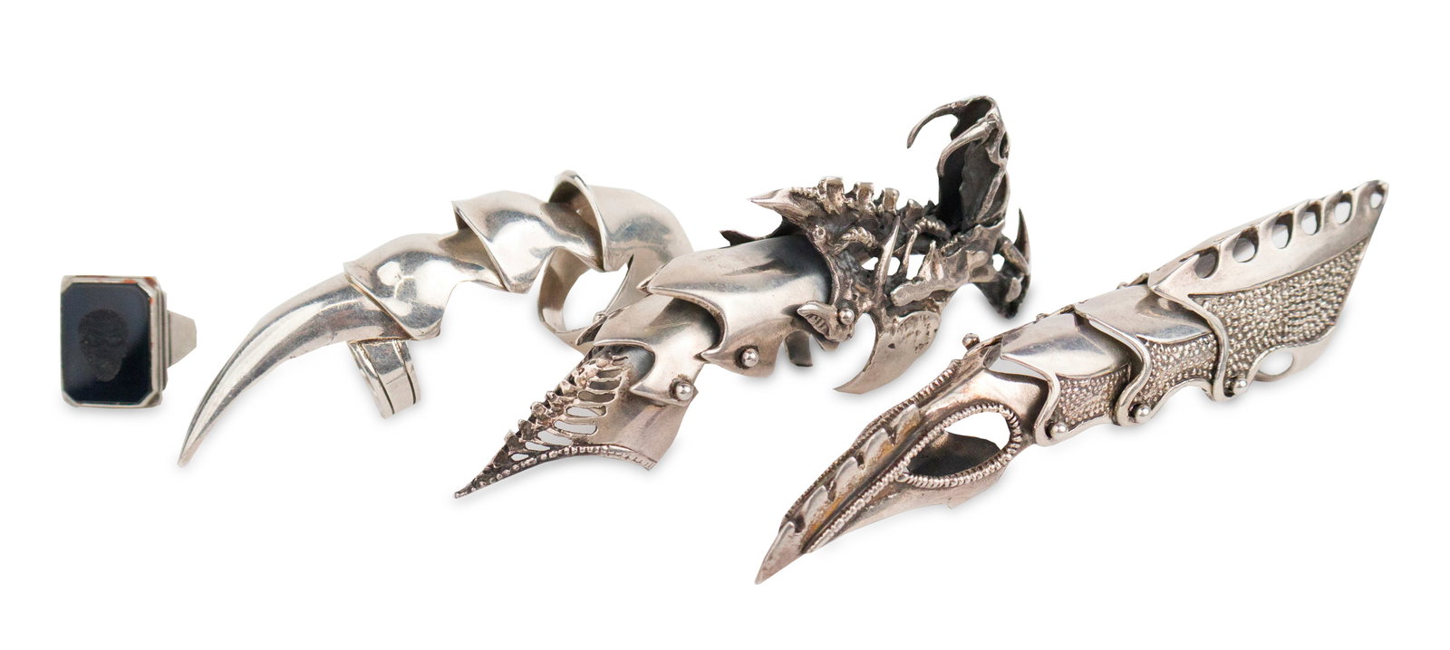 Three Vintage 925 Silver Knuckle Rings: Three Vintage 925 Silver Knuckle Rings Together with a 800 silver ring. Approx. 5 t.o. 5 in. (12.7 cm.)