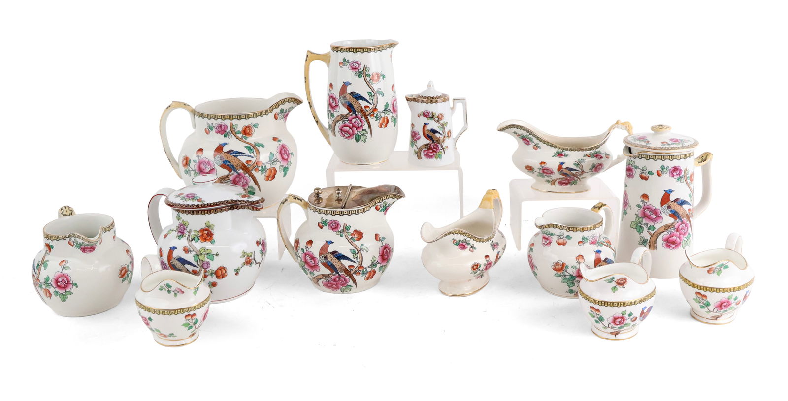Sixteen Pheasant Pattern Pitchers, Creamers, and Sauce Boats: Sixteen Pheasant Pattern Pitchers, Creamers, and Sauce Boats Including, Aynsley, Whieldon Ware and Victoria Austria. Wear, losses, surface distress. Largest: 6 1/2 x 8 1/2 x 6 1/2 in. (16.5 x 21.6 x