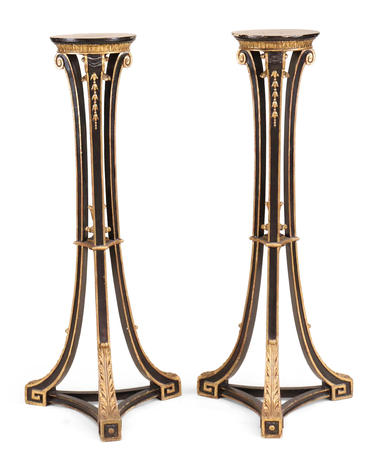 Pair of French Empire Ebonized and Parcel-Gilt Torcheres: Pair of French Empire Ebonized and Parcel-Gilt Torcheres French, 19th C. Surface distress and wear. 46 1/4 x 18 in. (117.5 x 45.7 cm.)