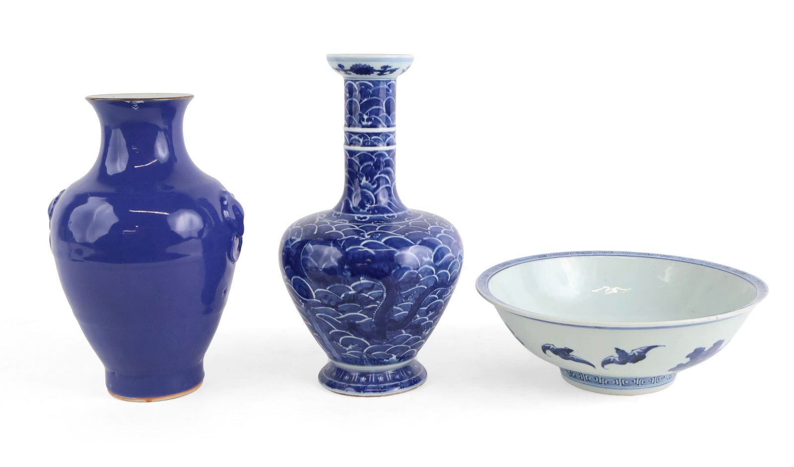 Chinese Blue and White Bat Decorated Bowl: Chinese Blue and White Bat Decorated Bowl With partial wax seal underside. Together with a blue glazed porcelain vase and a blue and white dragon decorated porcelain vase. Surface distress. Bowl: 3