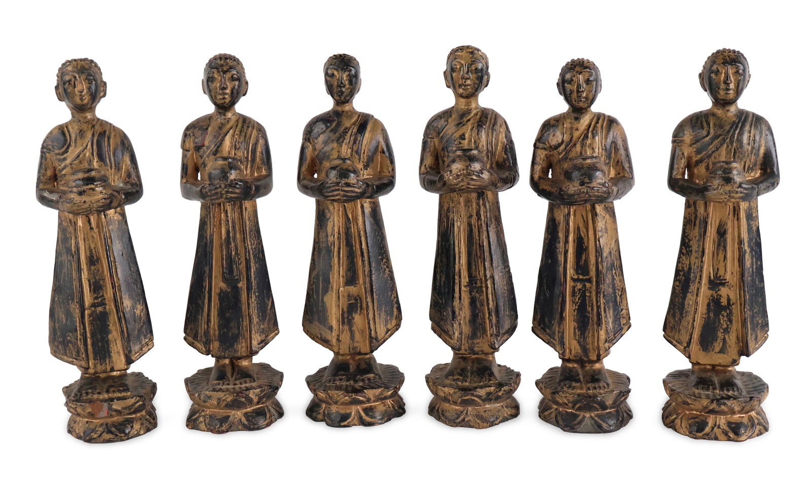Six Chinese Carved Wood Buddhist Disciples: Six Chinese Carved Wood Buddhist Disciples 20th C. Some cracks and wear. 12 3/4 x 3 x 3 in. (32.4 x 7.6 x 7.6 cm.)
