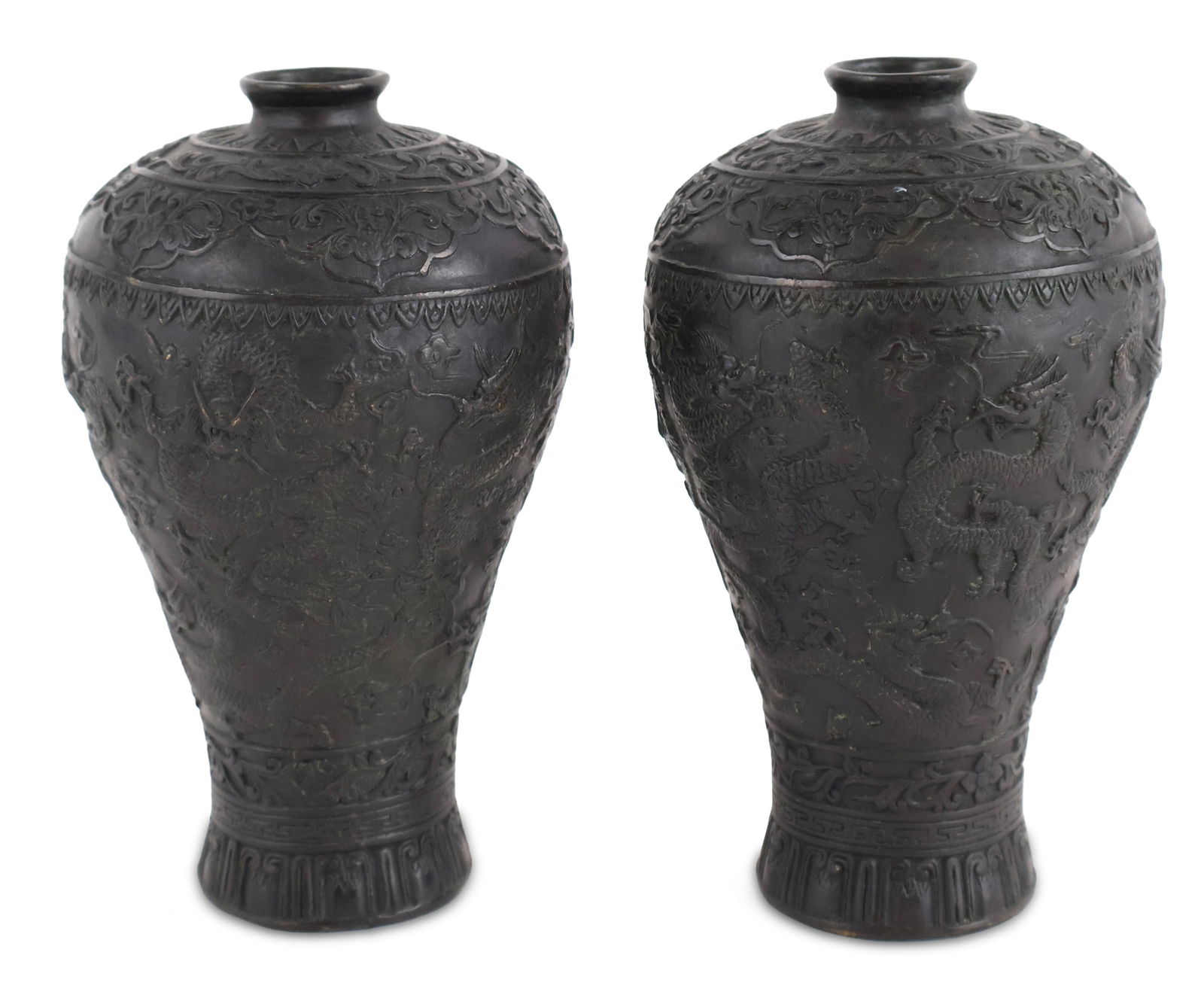 Pair of Chinese Repousse Bronze Meiping Bud Vases: Pair of Chinese Repousse Bronze Meiping Bud Vases 20th C. marked underside. 7 x 4 1/4 in. (17.8 x 10.8 cm.)