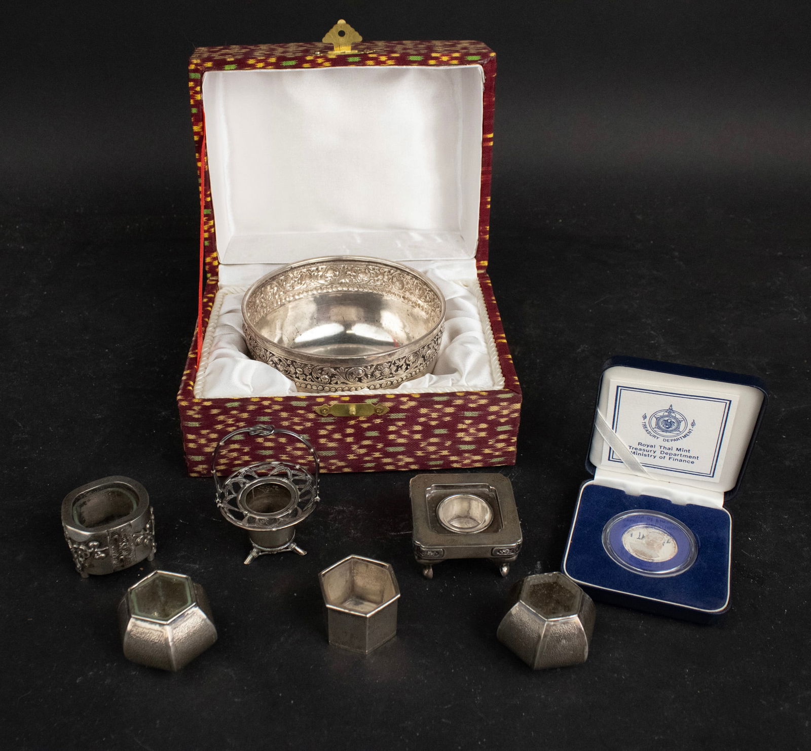 Six Asian Silver Salts: Six Asian Silver SaltsSome marked silver or sterling. Together with a silver bowl from the Cambodian Prime Minister His Royal Highness Samdech Krom Preah Norodom Ranariddh and a commemorative coin fro