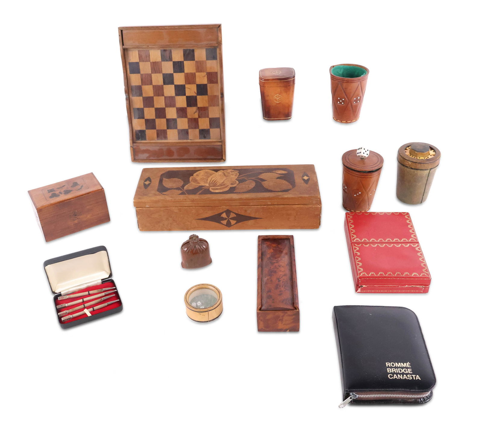 Group of Gambling and Card Game Accessories: Group of Gambling and Card Game Accessories Including, dice rollers, a Cartier playing card set, a chess board, playing card boxes, and a set of game pieces.