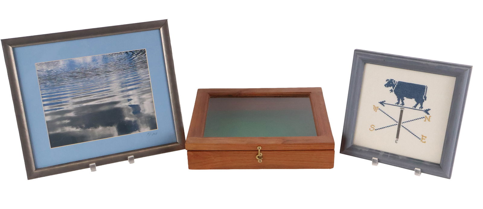 Oak Tabletop Shadowbox: Oak Tabletop Shadowbox Together with a needlepoint of a weathervane and a photograph of rippling water, signed KY 2012. Shadowbox: 2 3/4 x 13 1/4 x 11 in. (7 x 33.7 x 27.9 cm.)