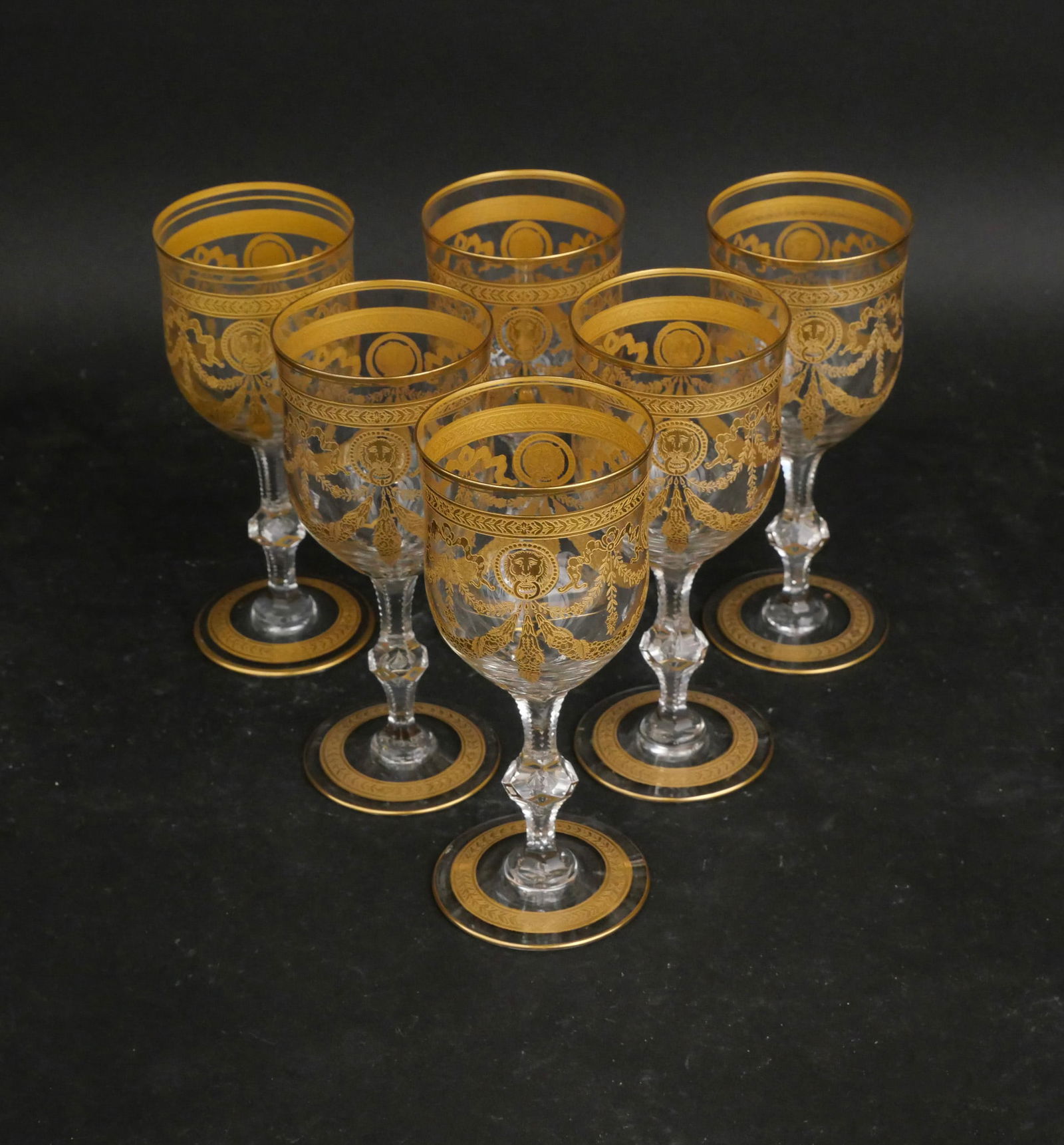Six St. Louis Crystal "Congress" Water Goblets: Six St. Louis Crystal "Congress" Water Goblets Clear crystal with gold-encrusted lion medallions, elaborate swags, and banded borders. 7 1/2 x 3 1/4 in. (19.1 x 8.3 cm.)