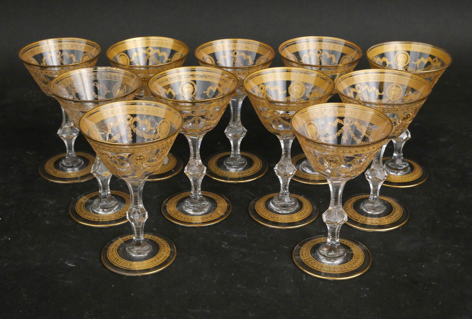 Eleven St. Louis Crystal "Congress" Sherry Glasses: Eleven St. Louis Crystal "Congress" Sherry Glasses Clear crystal with gold-encrusted lion medallions, elaborate swags, and banded borders. 4 3/4 x 2 7/8 in. (12.1 x 7.3 cm.)