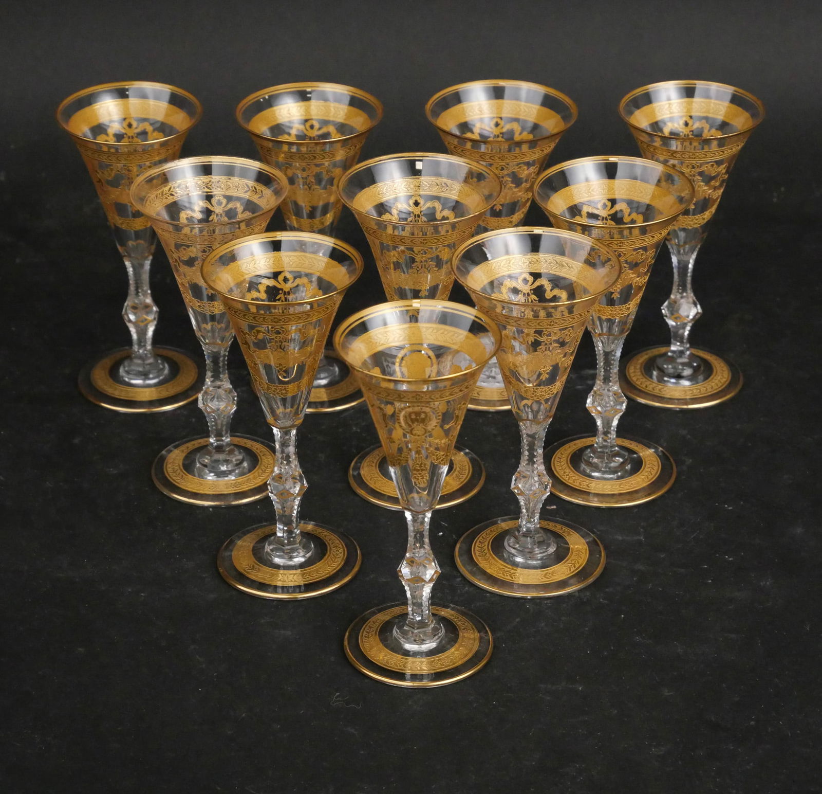 Ten St. Louis Crystal "Congress" Fluted Cordials: Ten St. Louis Crystal "Congress" Fluted Cordials Clear crystal with gold-encrusted lion medallions, elaborate swags, and banded borders. 5 x 2 1/2 in. (12.7 x 6.4 cm.)