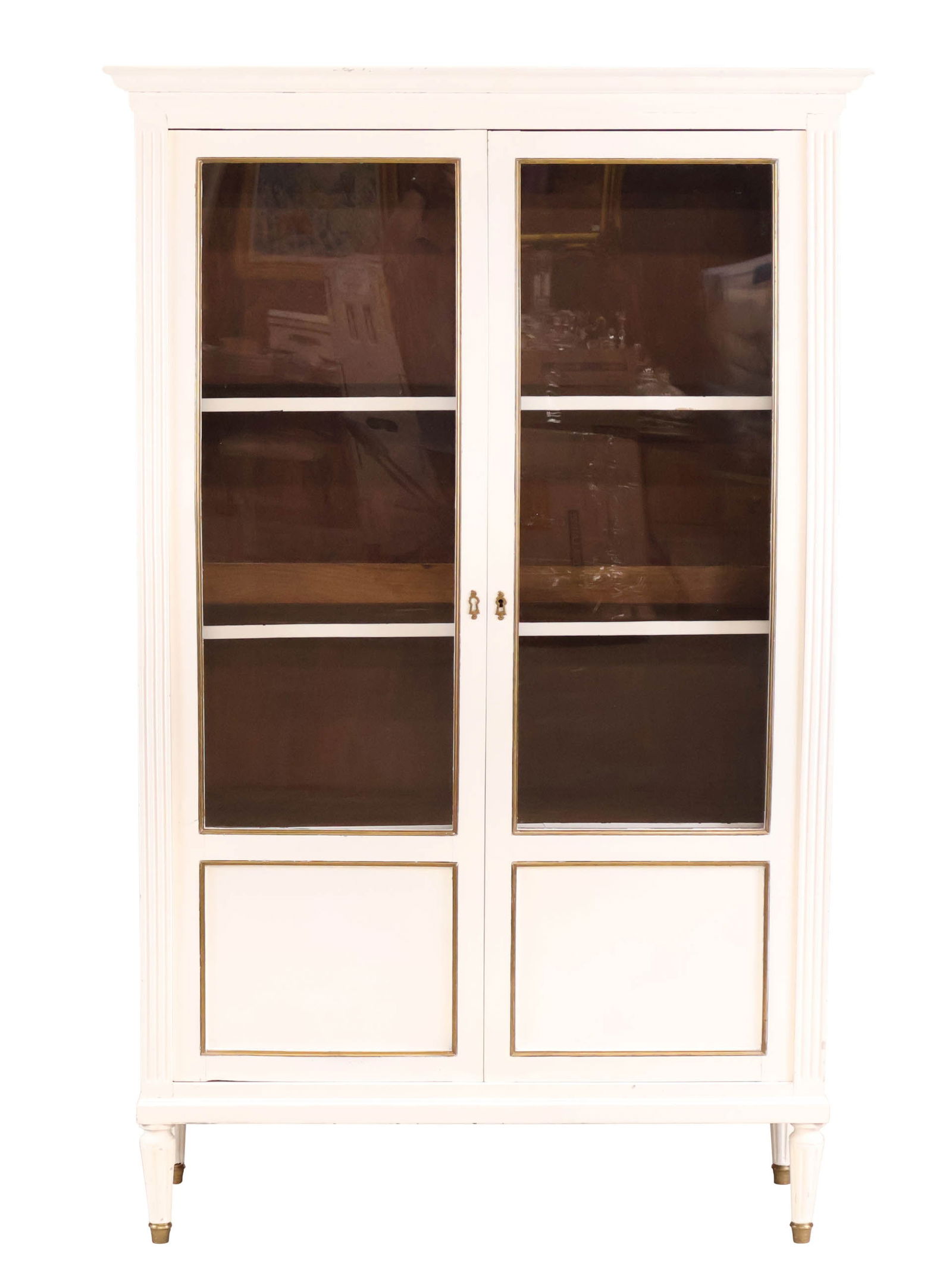 Louis XVI Style White Painted Brass Mounted Wall Cabinet: Louis XVI Style White Painted Brass Mounted Wall Cabinet French Taste, 20th C. fitted with shelves. 72 x 46 x 17 1/2 in. (182.9 x 116.8 x 44.5 cm.)