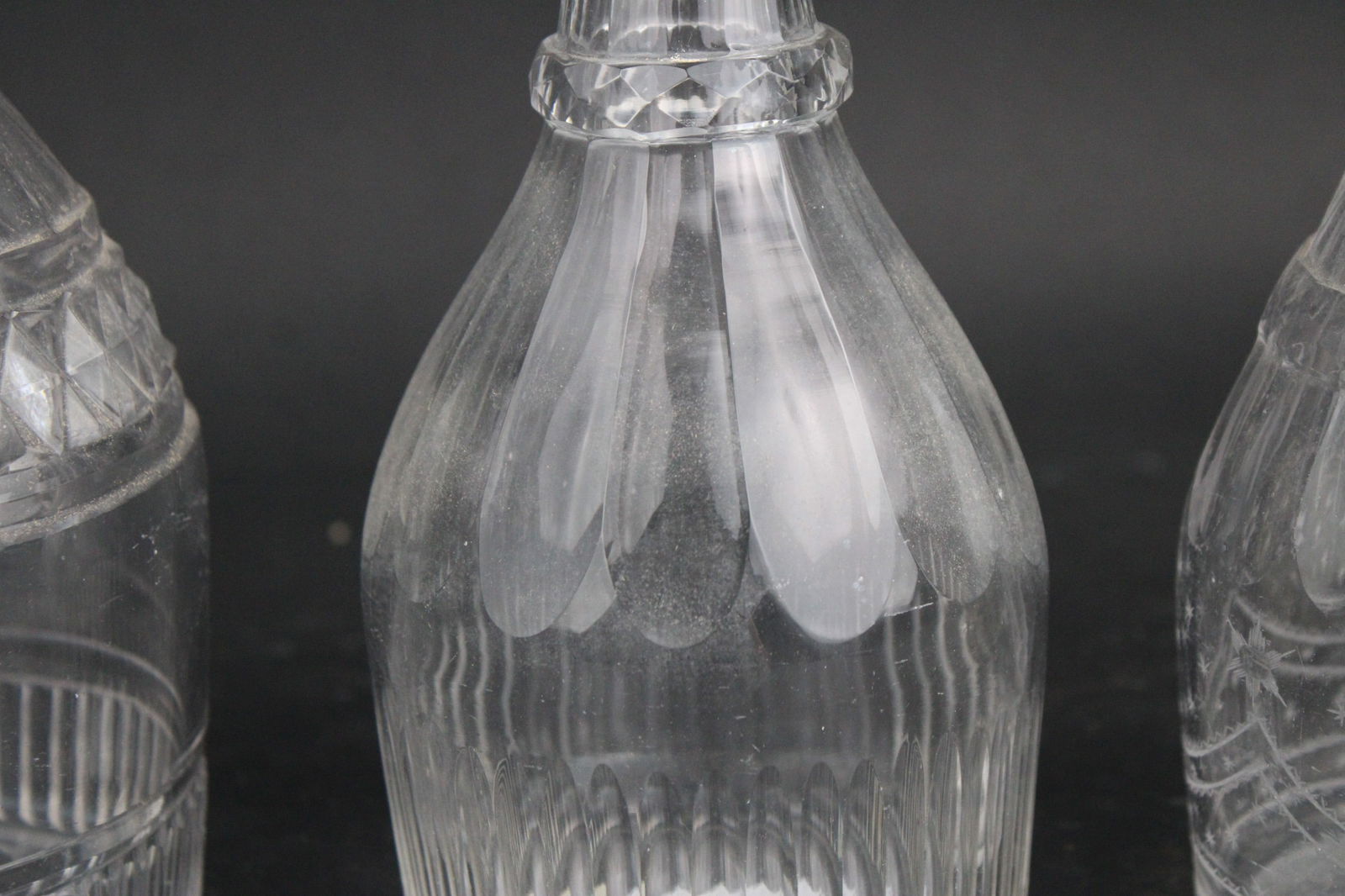 Five Colorless Glass Decanters - 12
