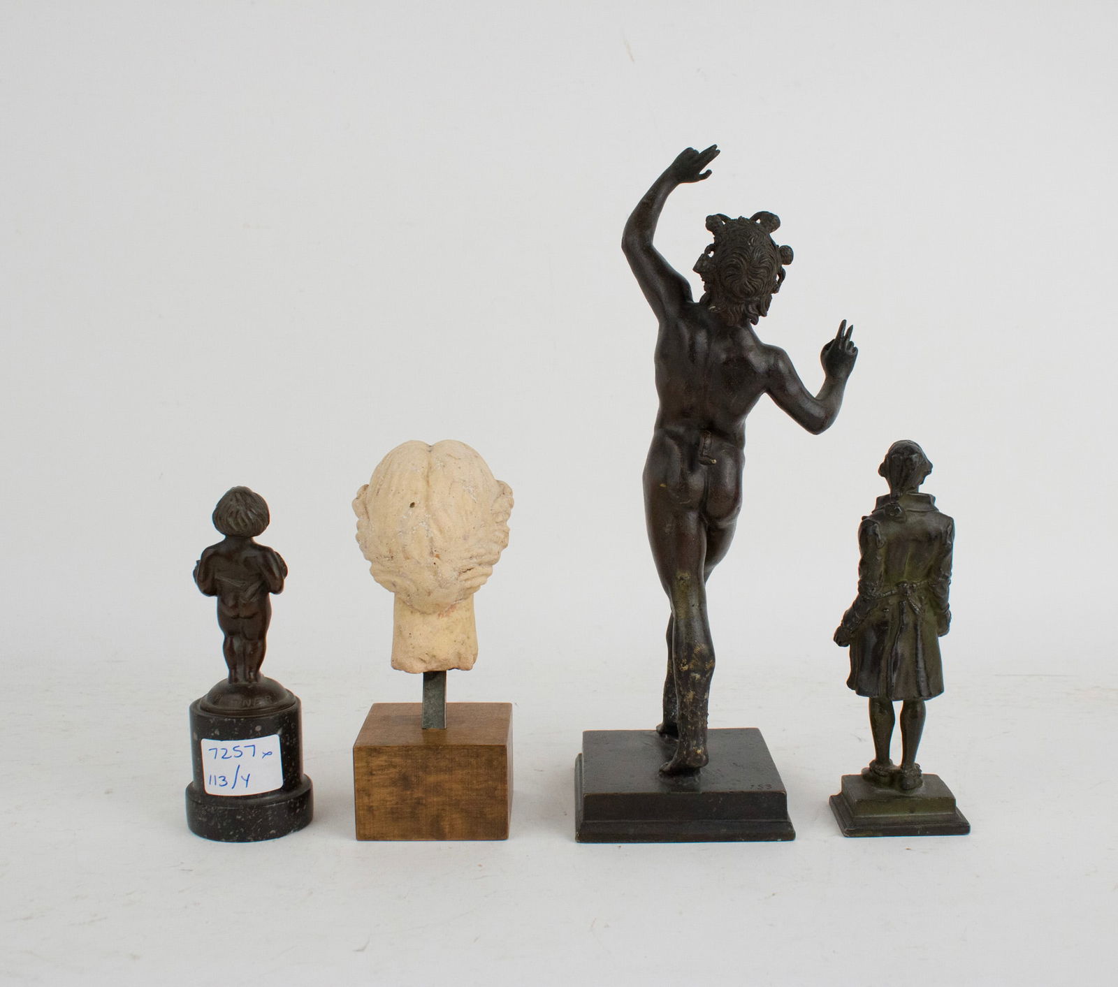Four Small Statues - 8
