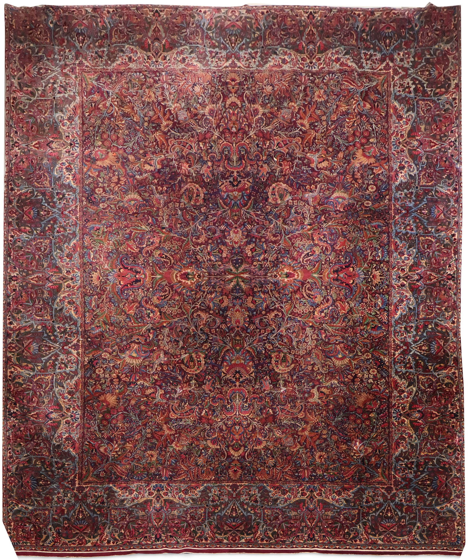 Kerman Carpet: Kerman CarpetSoutheast Persia, 2nd 1/4 20th C. Minor color bleeding, nicks to perimeter15'6"l x 11'6"w