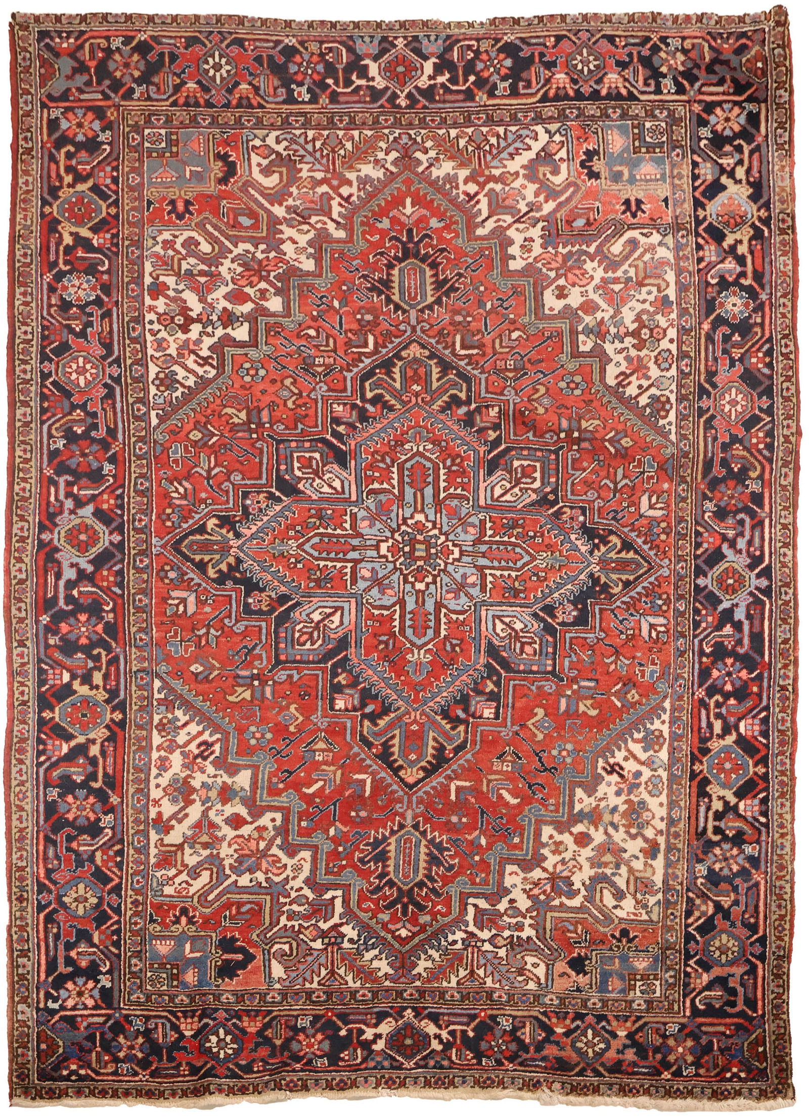 Heriz Carpet: Heriz CarpetNorthwest Persia, 2nd 1/4 20th CenturyMinor losses to ends, restored areas to ends9'4"lx 6'4"w