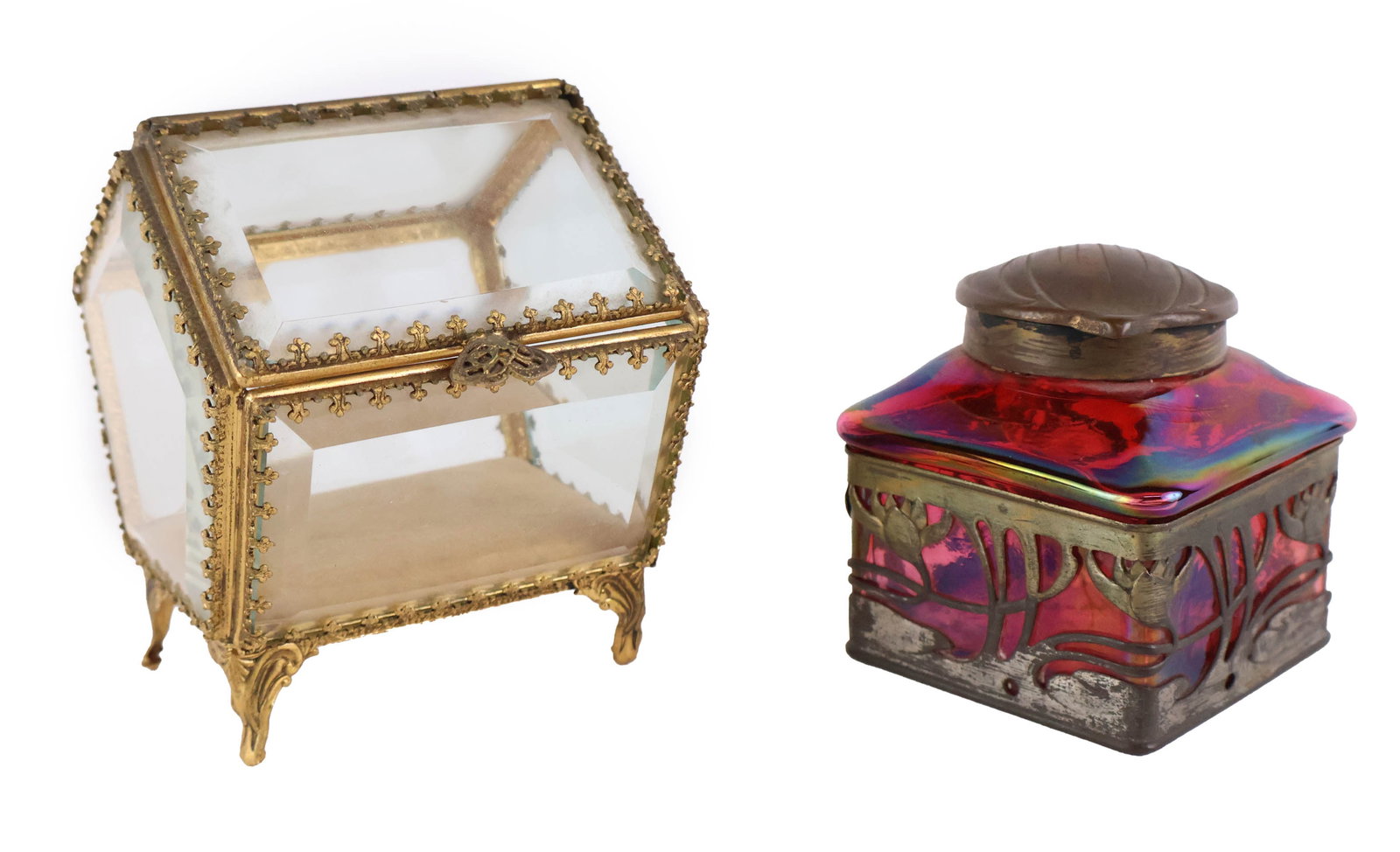 Art Deco Metal Mounted Cranberry Glass Inkwell: Art Deco Metal Mounted Cranberry Glass InkwellInscribed inside lid "JEP 10385/DRSM 166130 (?)". Together with a gilt metal and glass casket. Some wear, surface distress.3 1/8 x 2 3/4 x 2 3/4 in. (7.9