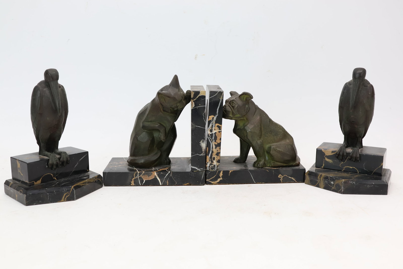 Vintage Pair of Art Deco Metal Stork Bookends: Vintage Pair of Art Deco Metal Stork BookendsVintage Pair of Art Deco Metal Stork Bookends. Together with a set of Art Deco French bookends marked I. Rochard of cat and dog. Used condition, wear, worn