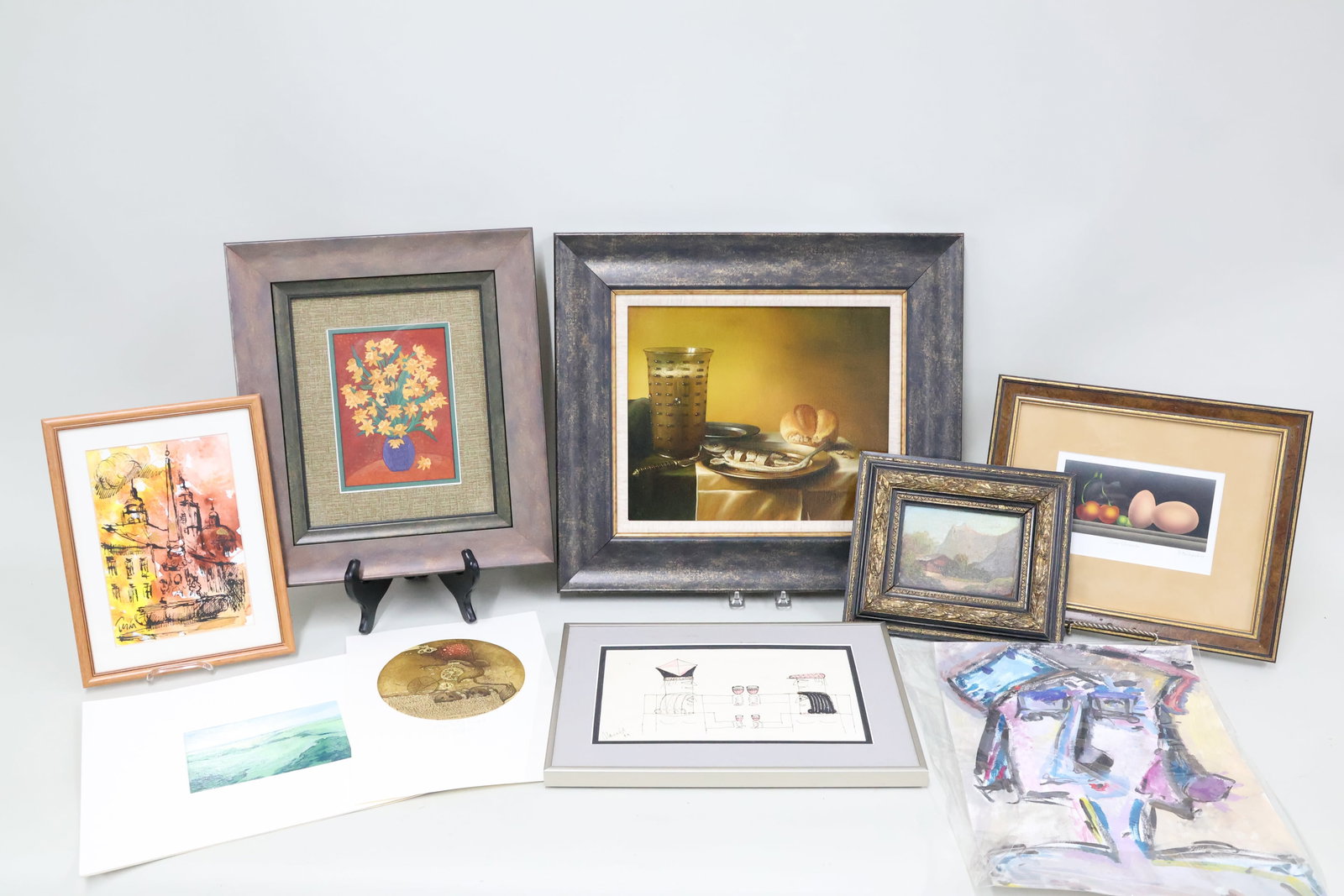 Group of Assorted Artwork: Group of Assorted Artwork Group of Assorted Artwork, including, mixed media still life of daffodils, a still life oil on canvas, inscribed verso "Still Life with Fish after P. Cloesz", abstract