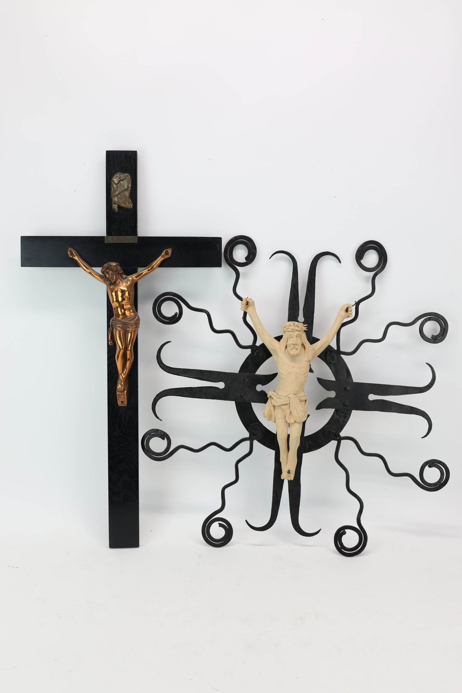 Carved Wooden Figure of Jesus: Carved Wooden Figure of Jesus Carved Wooden Figure of Jesus Mounted on Wrought Iron stand. Together with Jesus mounted on a crucifix. Used condition, wear, worn, losses. Wrought Iron: 23 1/2"h x