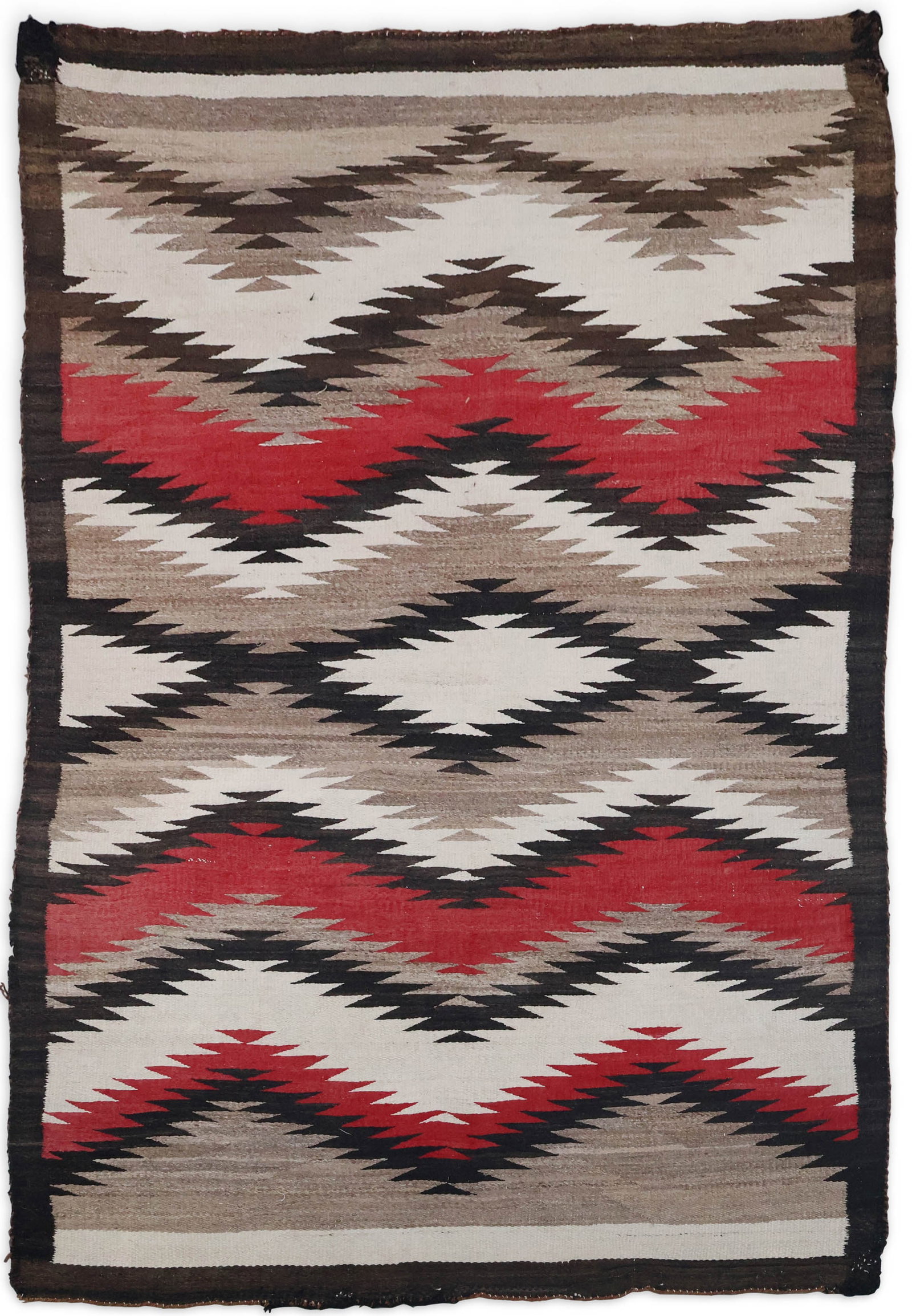 Navajo "Eye Dazzler" Rug: Navajo "Eye Dazzler" Rug First half 20th C. in beige, red, white, and brown. Some stains and wear. 65 1/2 x 45 1/2 in. (166.4 x 115.6 cm.)