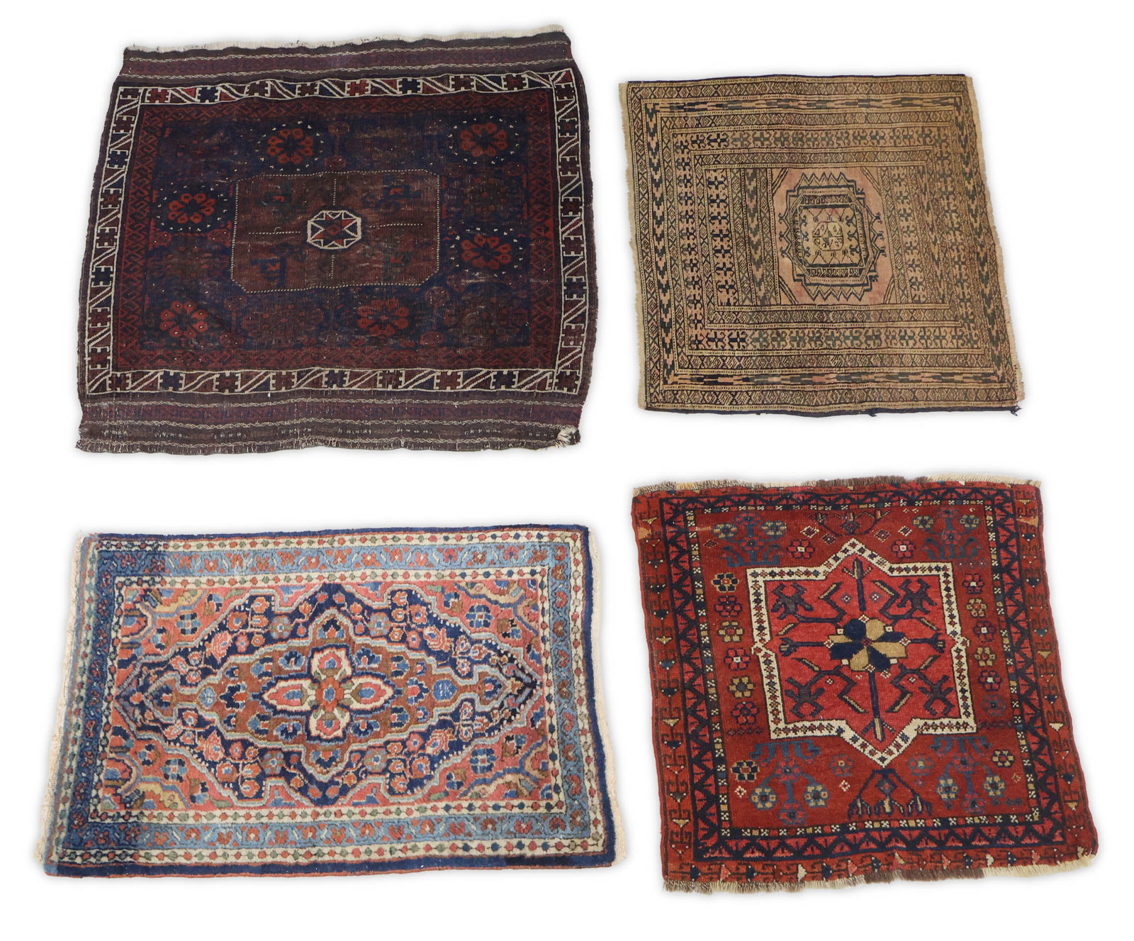 Four Assorted Mats: Four Assorted Mats A Baluch bagface, a Baluch mat, a Kurdish mat, and a Sarouk mat. 24 1/2 x 25 1/4, 27 3/4 x 25, 33 x 21 1/2, 33 1/2 x 35