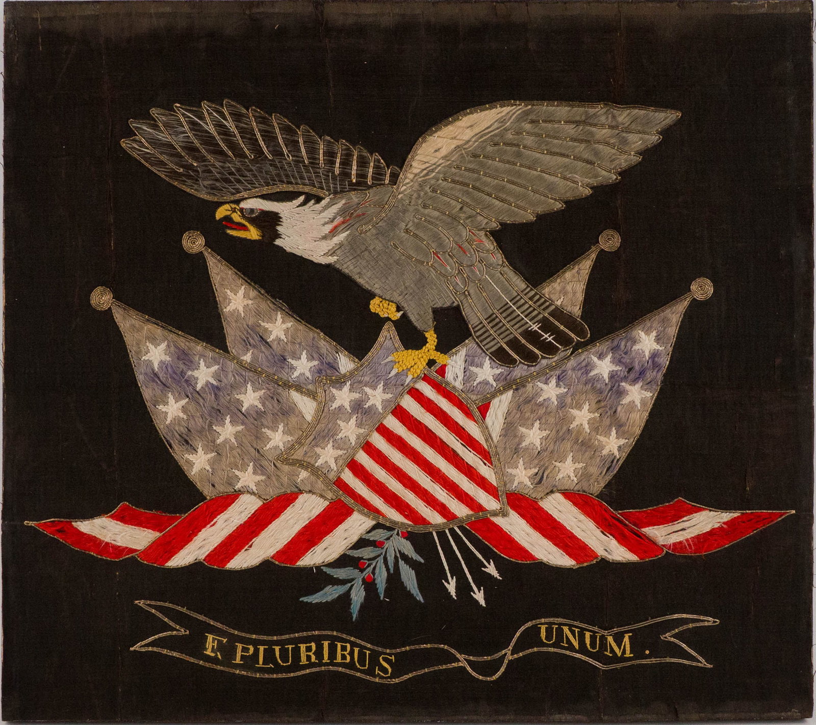 Japanese Export Silk Embroidery of American Eagle: Japanese Export Silk Embroidery of American Eagle19th C. with eagle over American flags and "E Pluribus Unum".Some wear, fading, small tears.18 1/4 x 20 1/2 in. (46.4 x 52.1 cm.)
