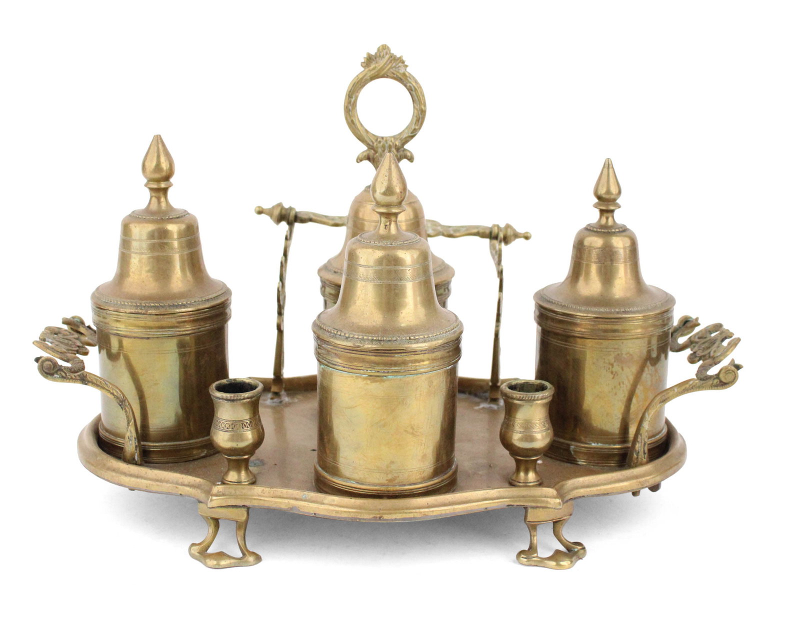 Engraved Brass Encrier: Engraved Brass Encrier Mid-19th C. With servants bell, four lidded pots, and two candle cups. Breaks to handle. 8 1/2 x 13 1/2 x 8 in. (21.6 x 34.3 x 20.3 cm.)