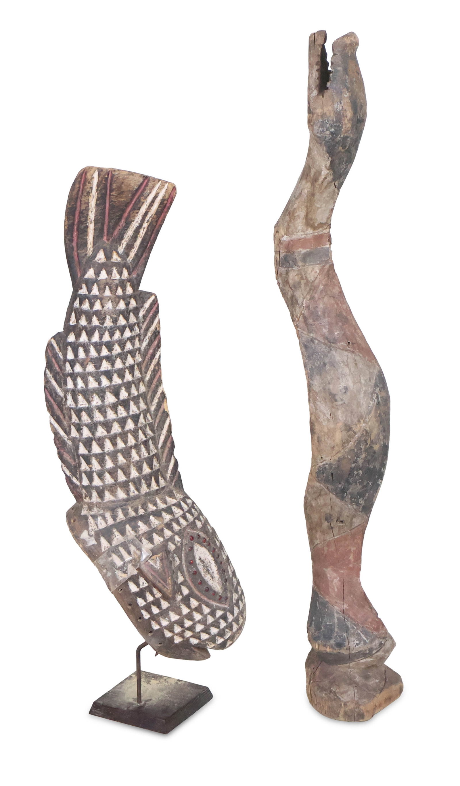 Baga Serpent Headdress: Baga Serpent Headdress Together with an African carved and painted wood fish-form mask. Surface distress and wear. Possibly reproductions. Largest: 38 in. (96.5 cm.)
