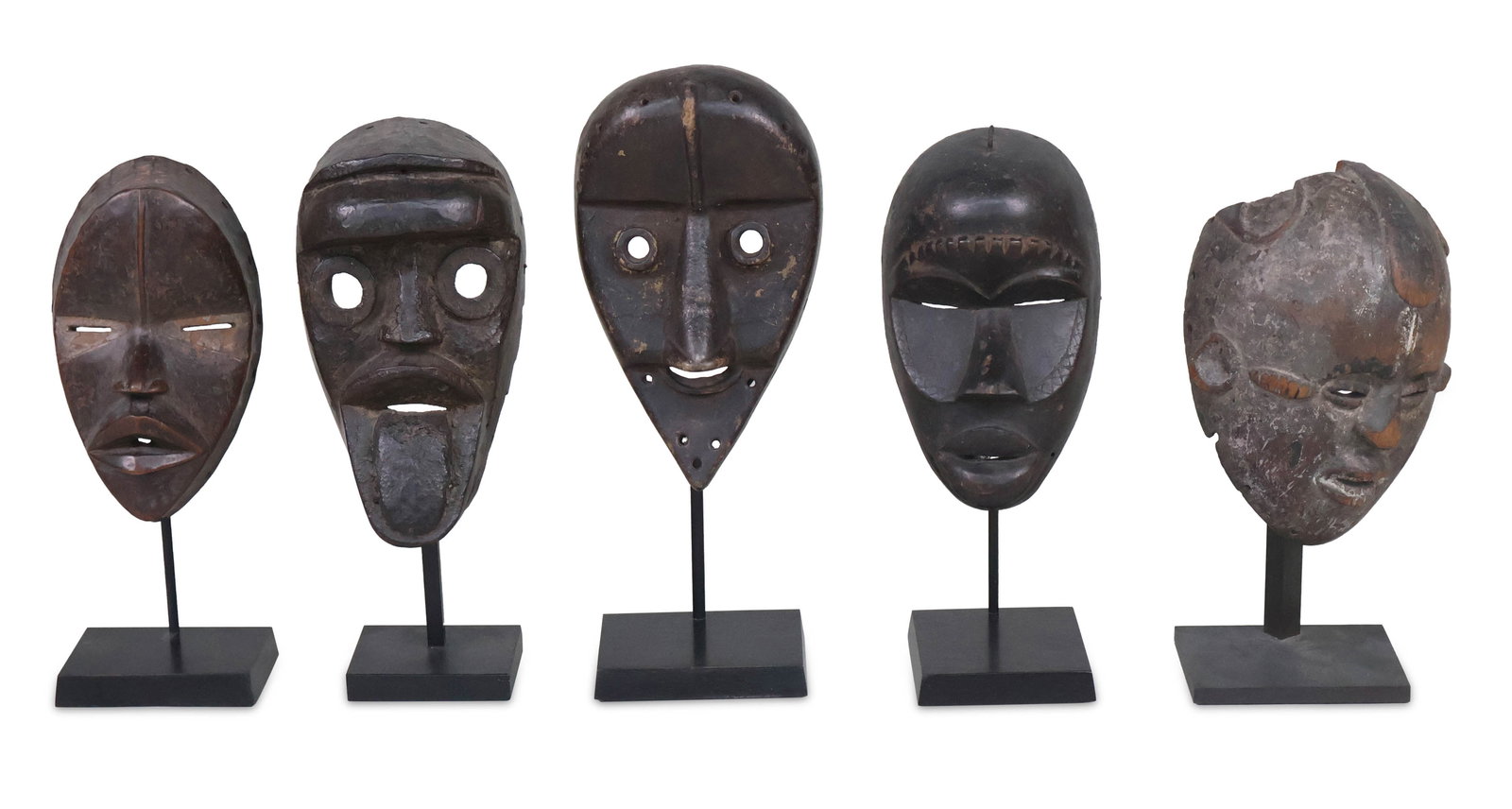 Five African Carved Wood Tribal Masks (1 of 10)