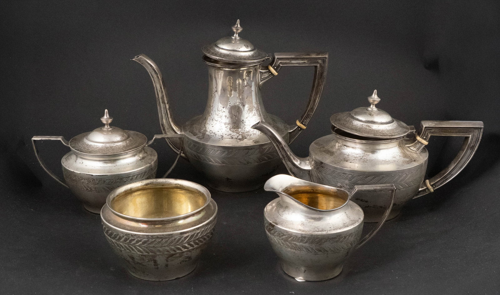 Vintage Alvin Sterling Silver Tea Set: Vintage Alvin Sterling Silver Tea Set #X19. Including: a teapot, coffee pot, waste bowl, a covered sugar, and creamer. Approx. 46 t.o. 8 in. (20.3 cm.)