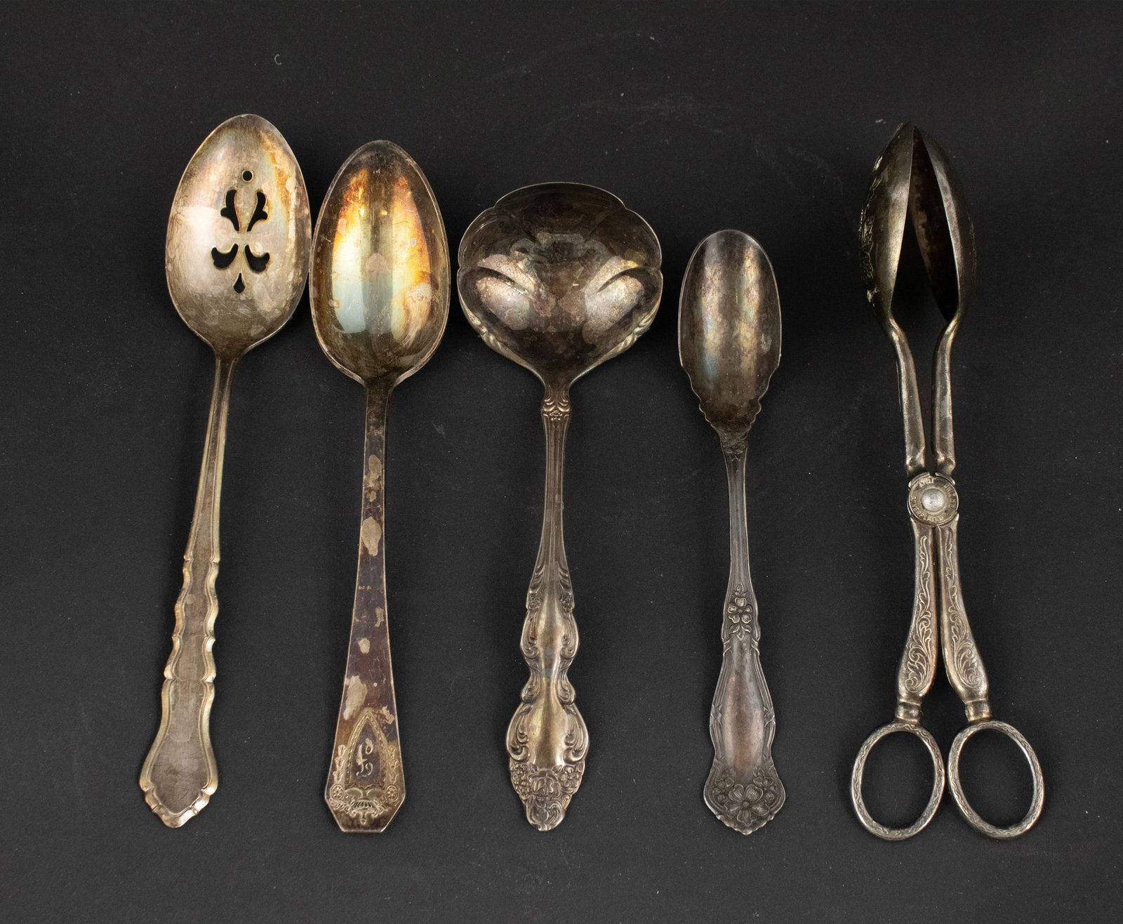 Five Silver Plated Serving Spoons: Five Silver Plated Serving Spoons Some wear. Largest: 8 1/2"l