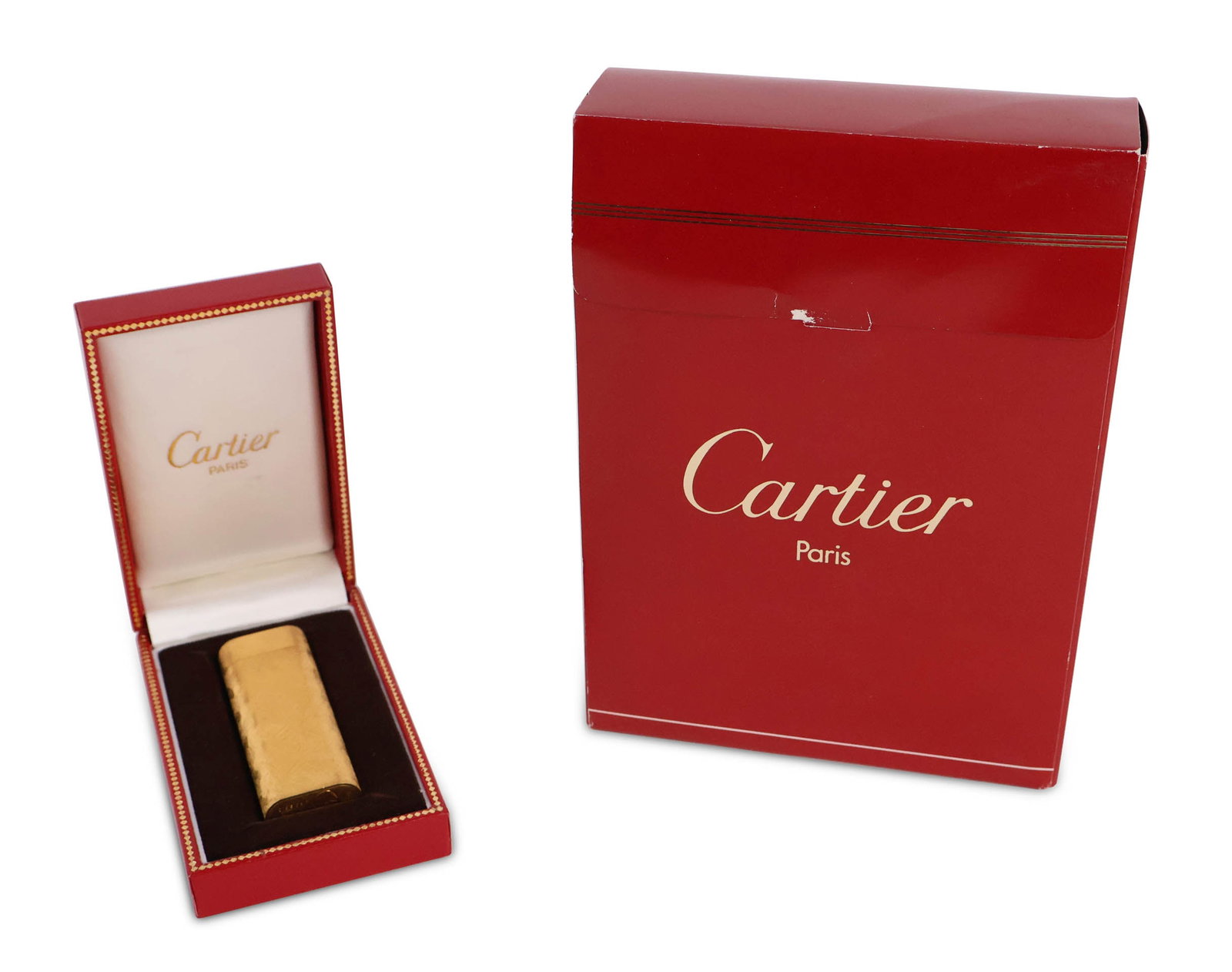 Cartier, Paris Lighter: Cartier, Paris Lighter #64059D. Together with a traveling kit with refills. 2 7/8"h x 1/2"w 1/2 in. (1.3 cm.)