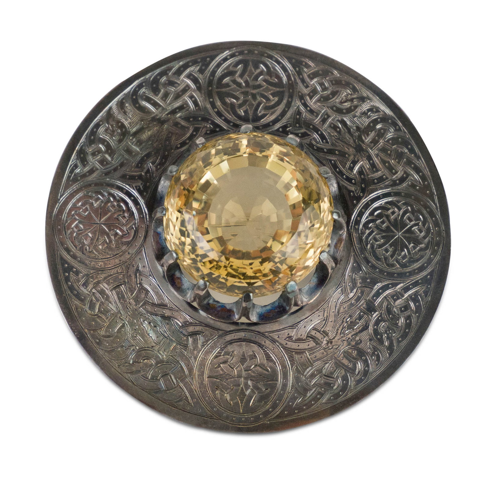Large Vintage Scottish Kilt Pin: Large Vintage Scottish Kilt Pin Circular with center cut stone possibly tourmaline, c. 1906. 3 in. (7.6 cm.)