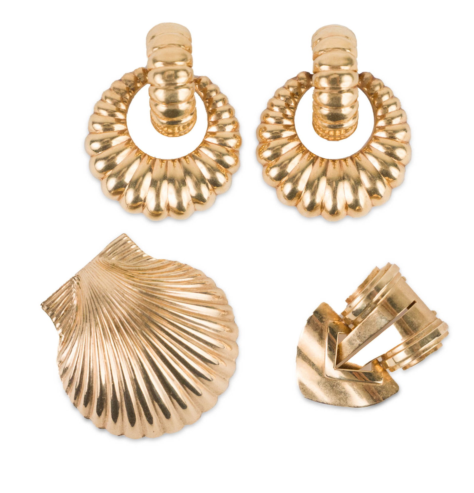 Pair of 14K Vintage Ear Clips: Pair of 14K Vintage Ear Clips 1.5"l. Together with a 12k Gold filled scallop shell pin, and a 14K dress or shoe clip. 1.5"l and approx. 22.86 total dwt. 1 1/2 in. (3.8 cm.)