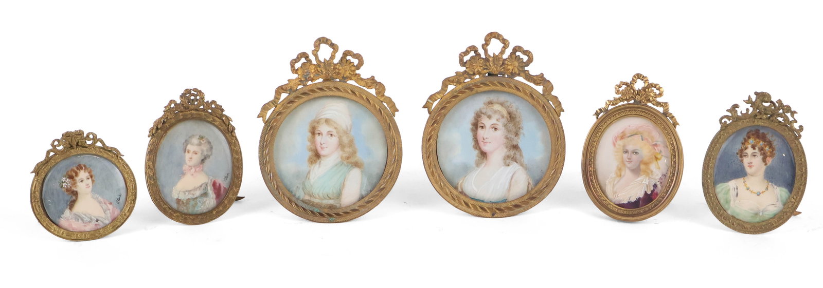 Six Portrait Miniatures of Women: Six Portrait Miniatures of Women In bronze dore frames. Provenance: Property from a Private Park Avenue, New York Collection Largest: 4 x 3 in. (10.2 x 7.6 cm.)