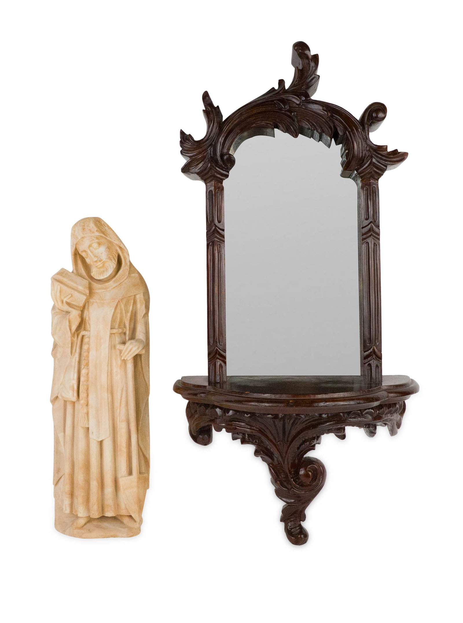Victorian Style Carved Mahogany Wall Shelf: Victorian Style Carved Mahogany Wall Shelf 20th C. with mirror back. Together with a composition figure of a saint. 16 1/4 x 5 x 2 in. (41.3 x 12.7 x 5.1 cm.), and 24 1/2 x 12 1/4 x 7 in. (62.2 x