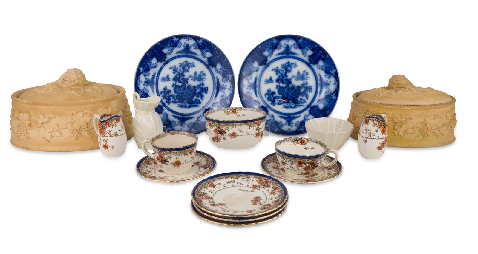 Two Wedgwood Canewood Game Pie Dishes: Two Wedgwood Canewood Game Pie Dishes Together with a group of Royal Doulton tea service items, a Belleek creamer and sugar bowl, and two J&G Meakin flow blue plates. Largest: 6 1/4 x 10 1/2 x 8 in.