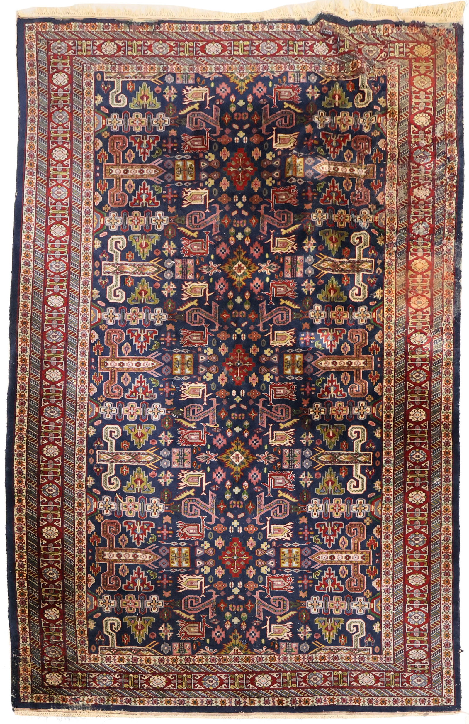 Indo-Perepedil Kuba Rug: Indo-Perepedil Kuba Rug India, late 20th C. Moth damage, stains, tinted areas. 9'2"l x 6'1"w