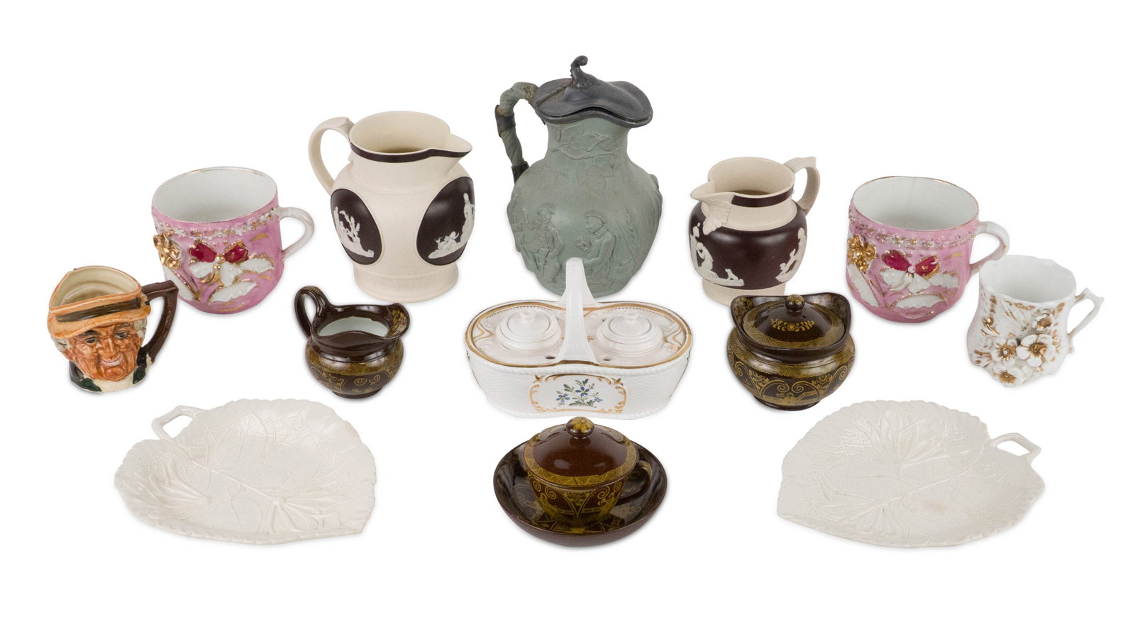 Group of Assorted Porcelain Table Articles: Group of Assorted Porcelain Table Articles Including, Wedgwood leaf-form footed plates, two Chatham and Wooley stoneware jugs, stoneware pewter lidded jug, marked "Willie", an inkpot, three teacups, a