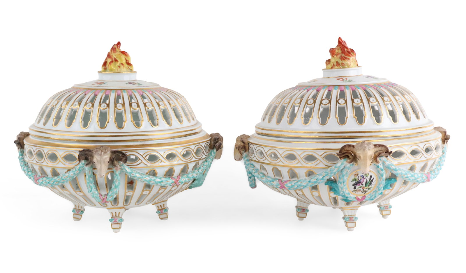 Two Nearly Identical Meissen Centerpiece Covered Baskets: Two Nearly Identical Meissen Centerpiece Covered Baskets Continental, c. 1870s, with gilt flambeau finial, rams mask handles, above circular cartouches, bases marked with blue crossed swords and incis