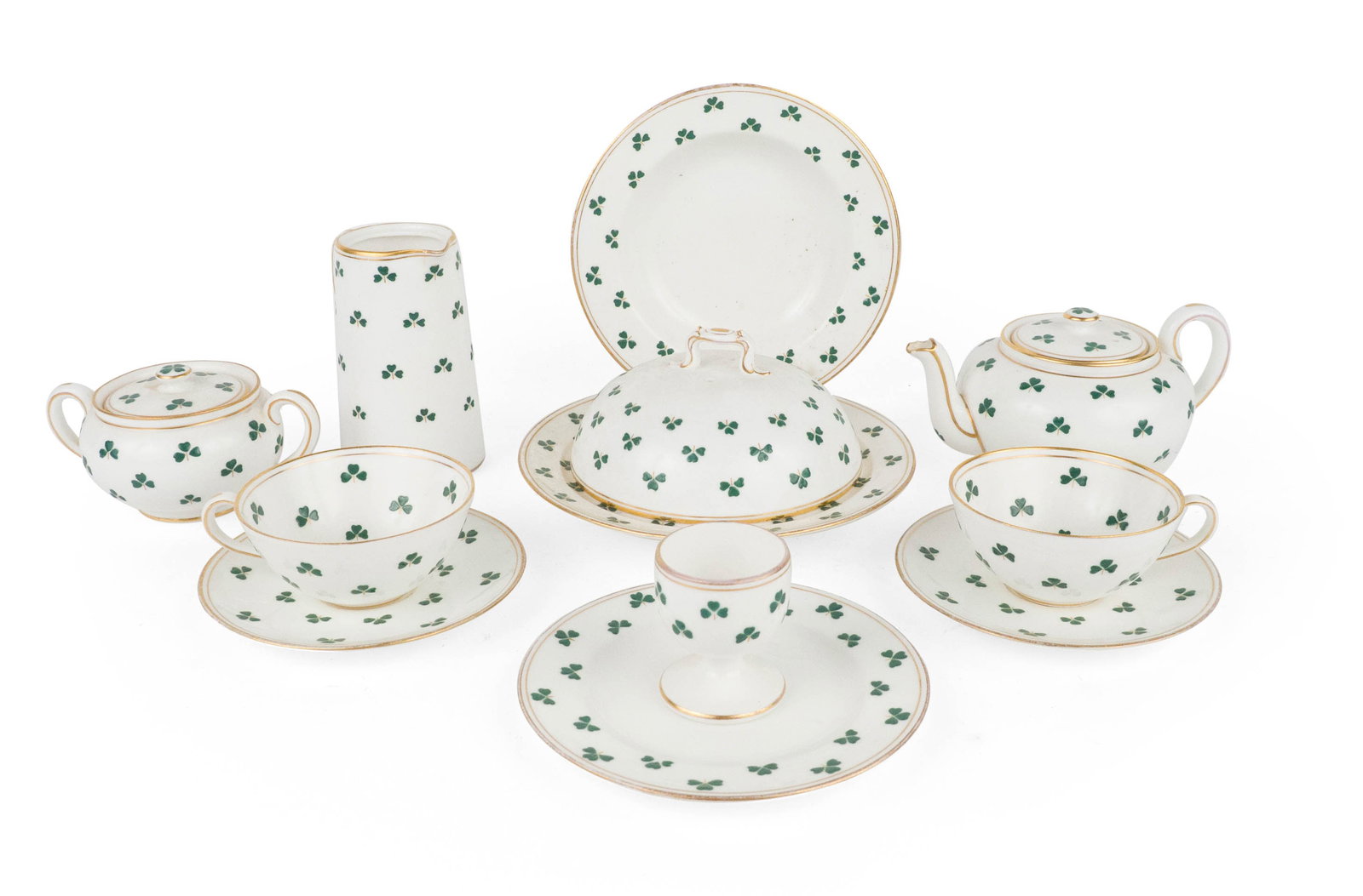 Royal Doulton Shamrock Decorated Porcelain Table Articles: Royal Doulton Shamrock Decorated Porcelain Table Articles Including, teacups and saucers, sugar bowl, teapot, butter dish, creamer. Stains, wear, surface distress, missing lid. 3 1/2 x 7 1/2 in. (8.9 