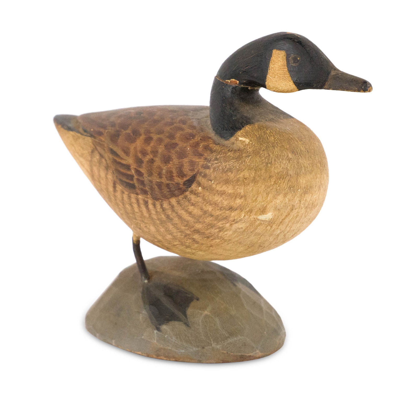 Miniature Canada Goose by A.J. Ditman: Miniature Canada Goose by A.J. Ditman New York, (1884-1974), signed on base. 3 1/2 x 4 1/4 x 1 3/4 in. (8.9 x 10.8 x 4.4 cm.)
