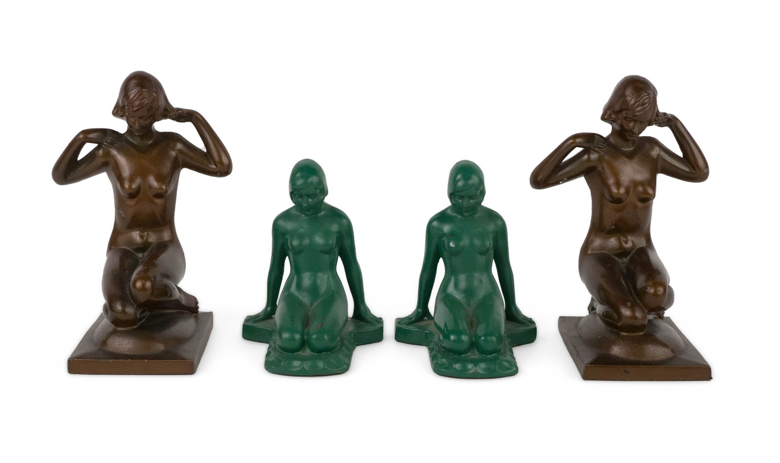 Two Pairs of Art Deco Bookends of Kneeling Women: Two Pairs of Art Deco Bookends of Kneeling Women One marked "BronzeArt" the other painted green. Losses to paint. 4 3/4 x 3 3/4 x 3 1/2 in. (12.1 x 9.5 x 8.9 cm.), and 6 3/4 x 3 x 4 in. (17.1 x 7.6 x