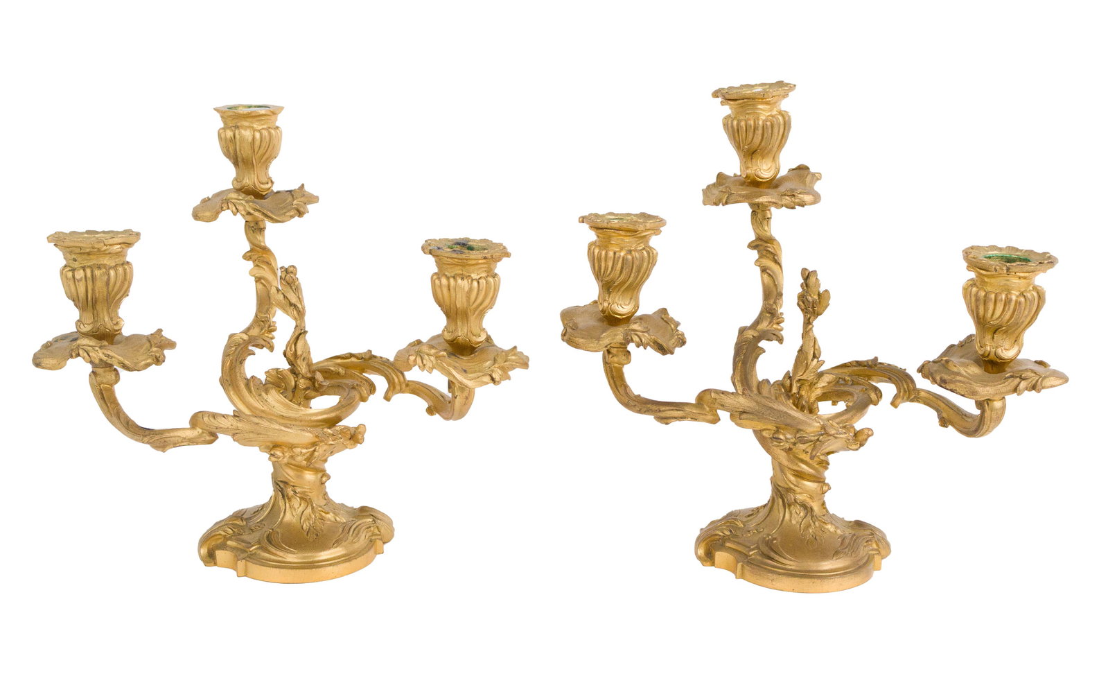 Pair of Louis XV Style Ormolu Candelabra: Pair of Louis XV Style Ormolu Candelabra 20th C. with three candle sockets. Some wear. Provenance: Property from a Private New York and German Collector 10 1/4 x 10 1/4 x 7 in. (26 x 26 x 17.8 cm.)