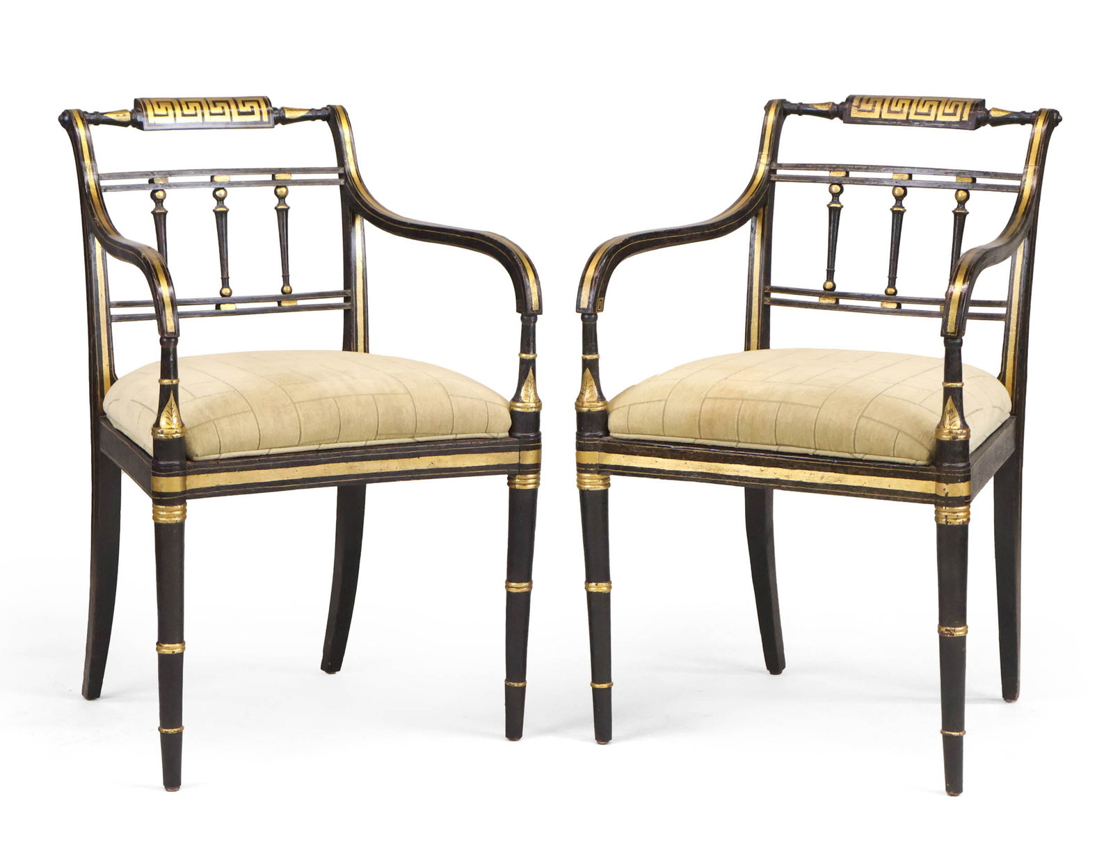 Pair of Regency Stenciled and Ebonized Armchairs: Pair of Regency Stenciled and Ebonized Armchairs English, c. 1820, with caned seats and cushions, Greek Key pattern gold paint. 33 3/4 x 21 1/4 x 19 in. (85.7 x 54 x 48.3 cm.)