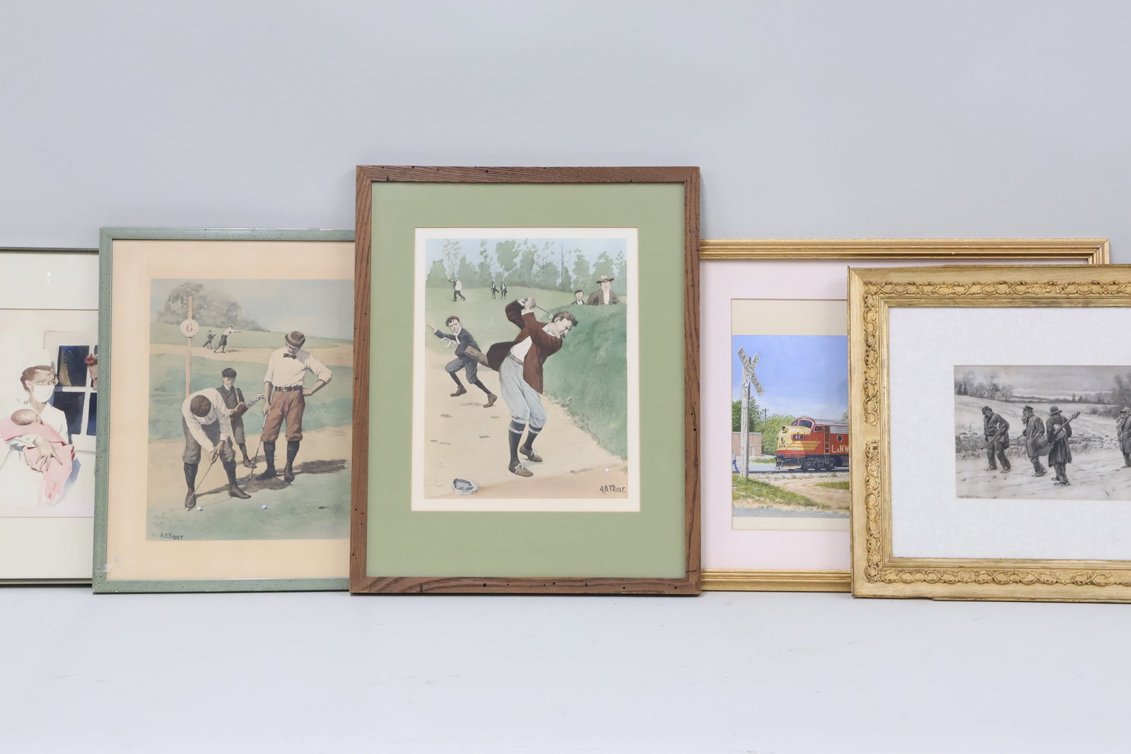 Two Vintage A.B. Frost Prints of Golfers: Two Vintage A.B. Frost Prints of Golfers Two Vintage A.B. Frost Prints of Golfers. Together with A.B. Frost print of Musician walking the trail in Winter landscape, Don Wallworth print of L & NW locom