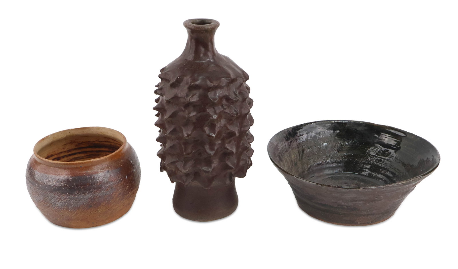 Three Brown Glazed Art Pottery Table Articles: Three Brown Glazed Art Pottery Table Articles Comprising, a vase with "sprouting" texture, planter, and a bowl, signed underside. Minor chips and wear. Largest: 12 1/2 x 6 in. (31.8 x 15.2 cm.)