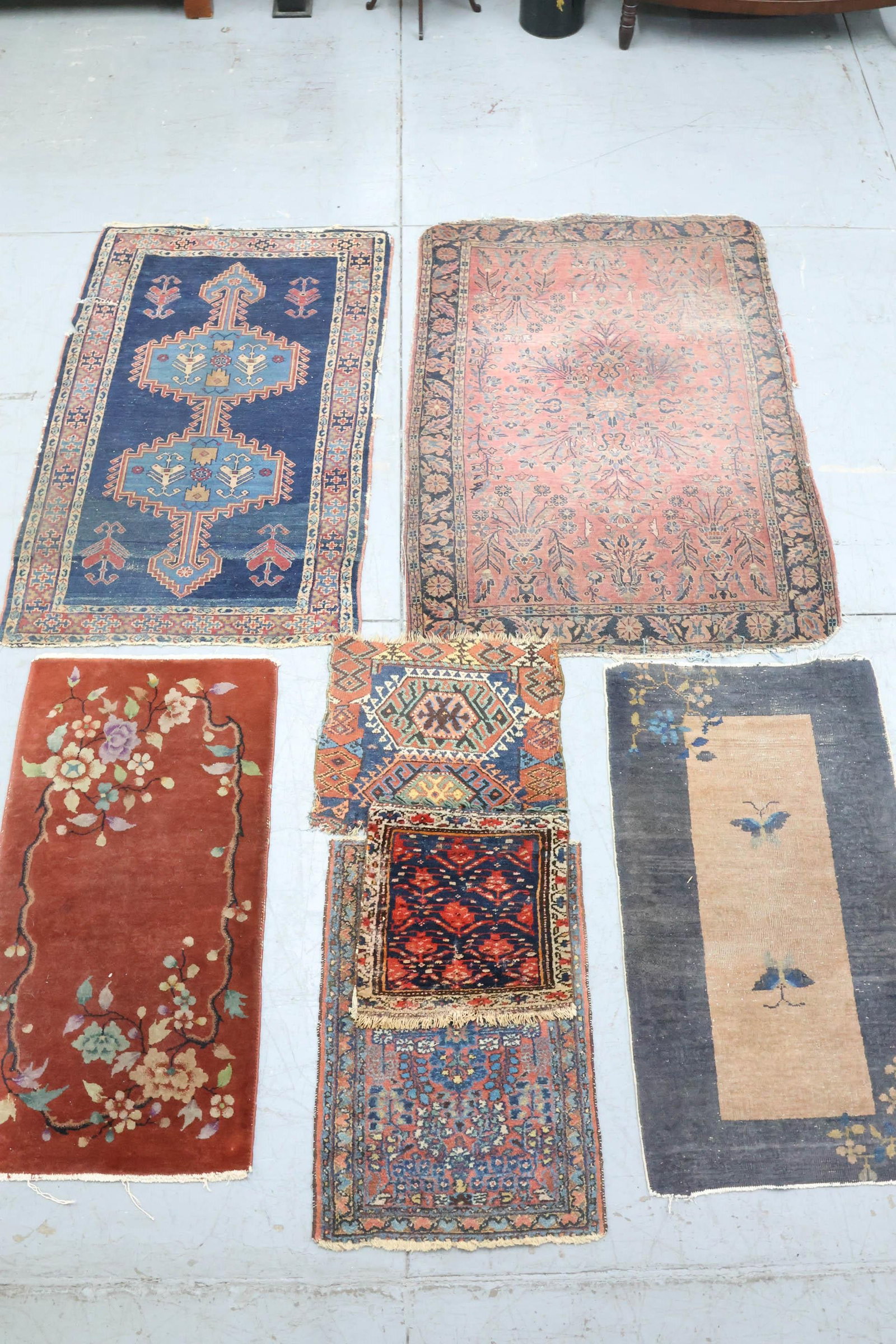 Group of Five Assorted Throw Rugs: Group of Five Assorted Throw Rugs Group of Five Assorted Throw Rugs. Comprising two Chinese, Turkish rug with central blue ground and geometric design 57" x 35", Persian matte having central brown