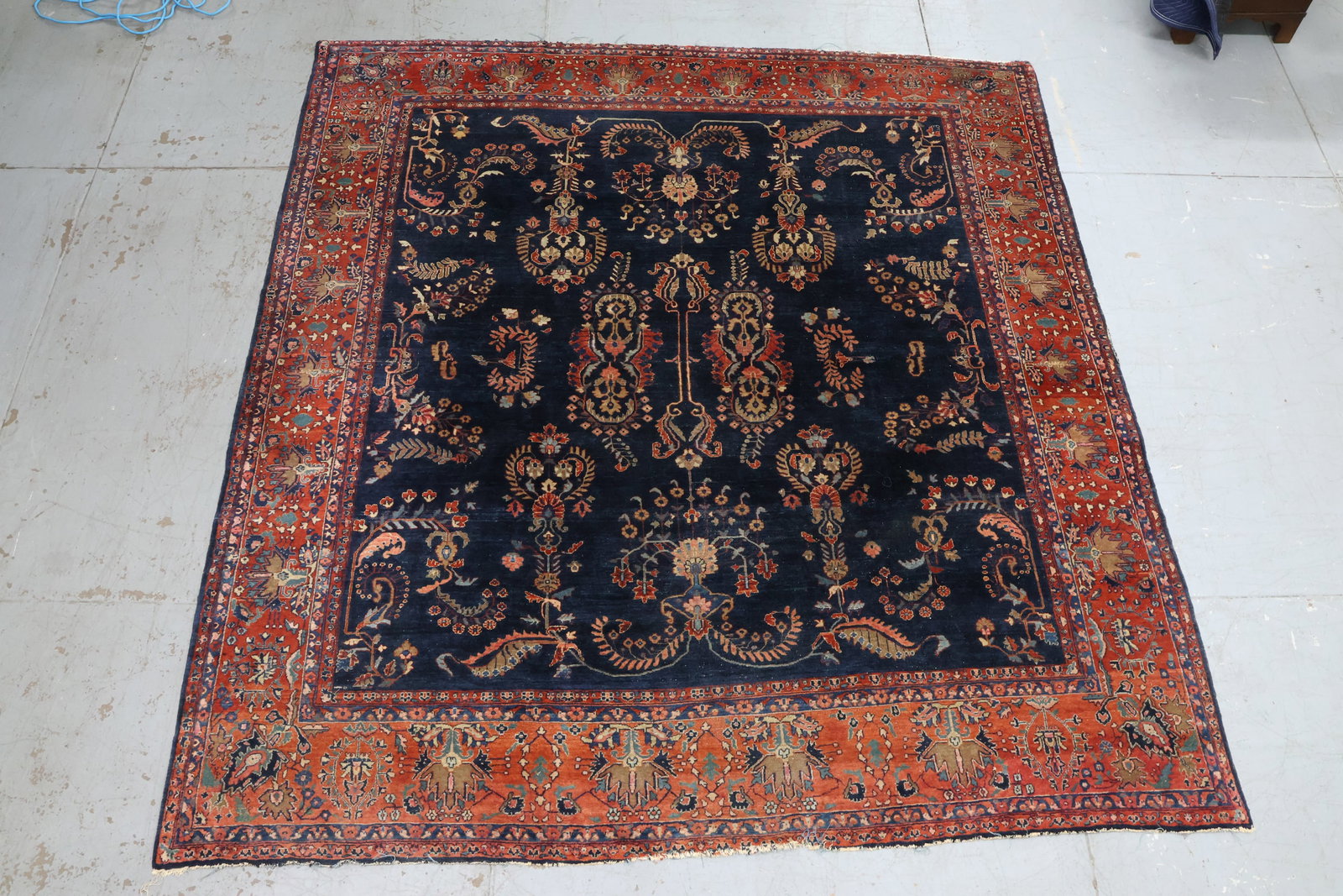 Heriz Persian Room Size Rug: Heriz Persian Room Size Rug Heriz Persian Room Size Rug. Having central blue ground with floral field. Used condition, wear, worn, losses. 114 1/2" x 105"