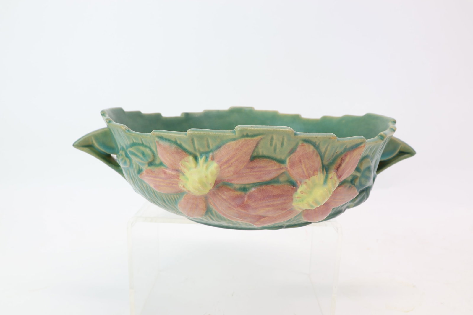 Vintage Roseville Pottery Clematis Console Bowl: Vintage Roseville Pottery Clematis Console Bowl Vintage Roseville Pottery Clematis Console Bowl. Raised pink clematis flowers on a green bowl with handles on either side. Marked "Roseville USA 457". R